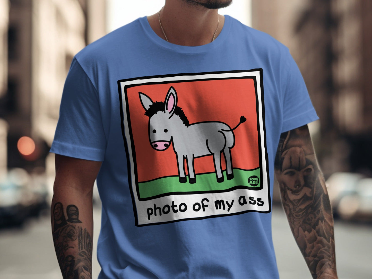 Cartoon donkey in a frame with "photo of my ass" text.
