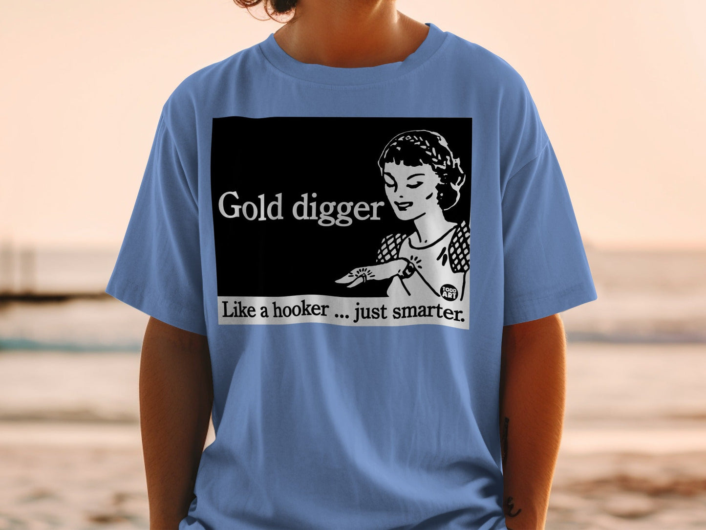 T-shirt with black graphic: "Gold digger. Like a hooker... just smarter."
