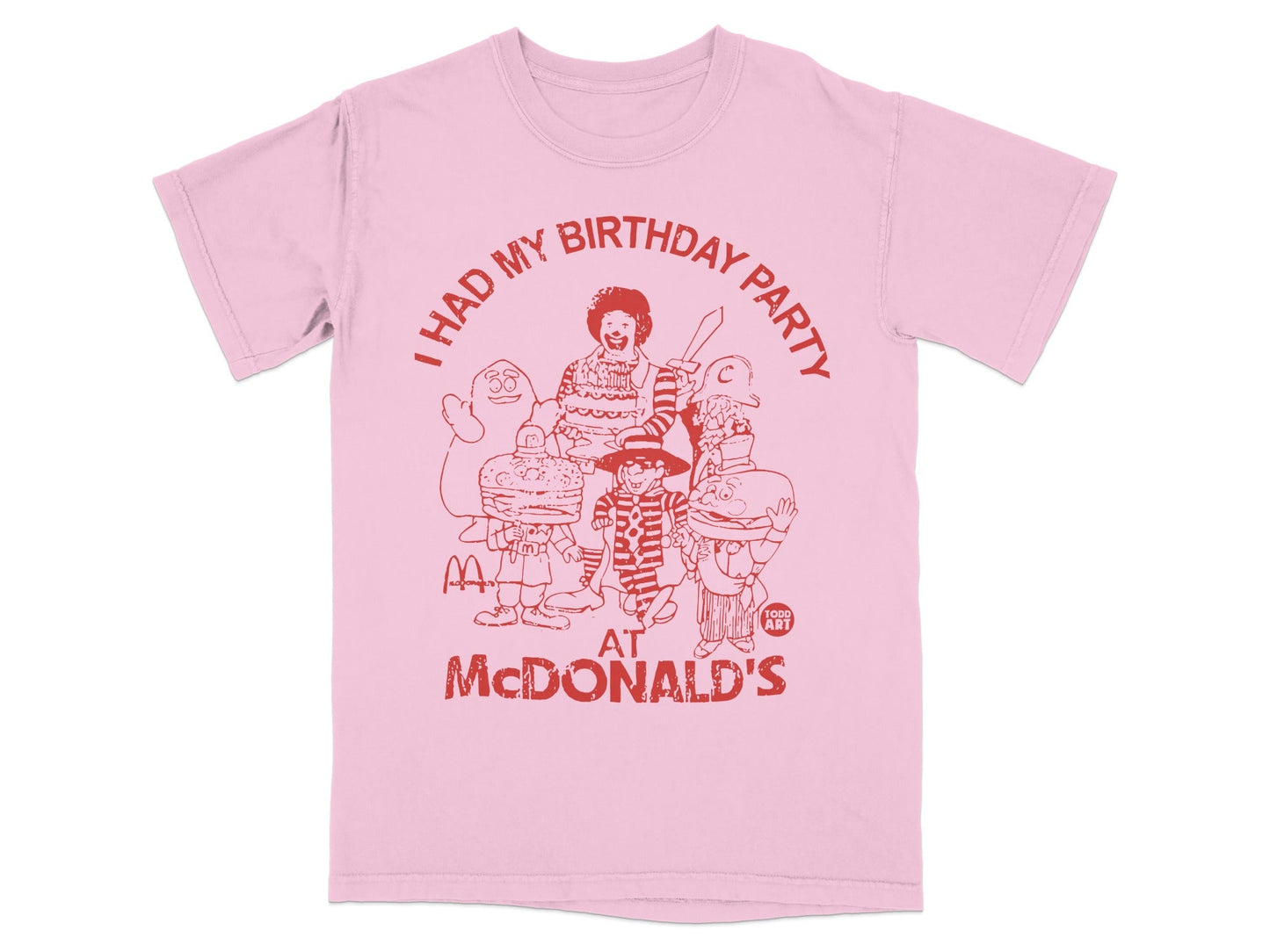 Pink t-shirt with "I HAD MY BIRTHDAY PARTY AT MCDONALD'S" and cartoon characters.
