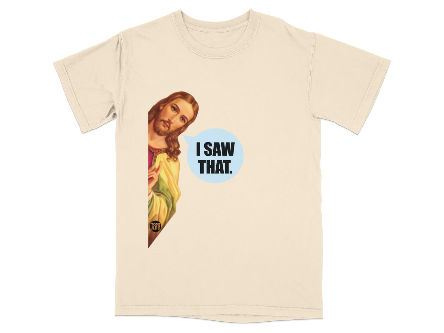 Cream t-shirt with Jesus peeking from the side saying "I SAW THAT."