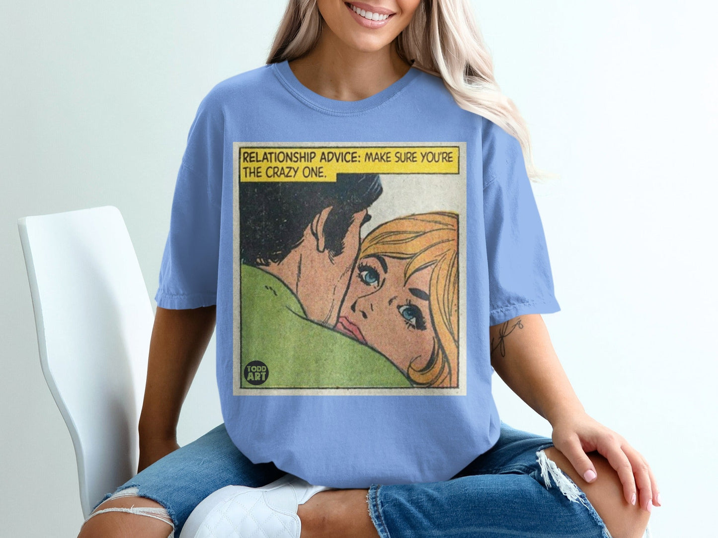 Blue t-shirt with comic panel: "RELATIONSHIP ADVICE: MAKE SURE YOU'RE THE CRAZY ONE."