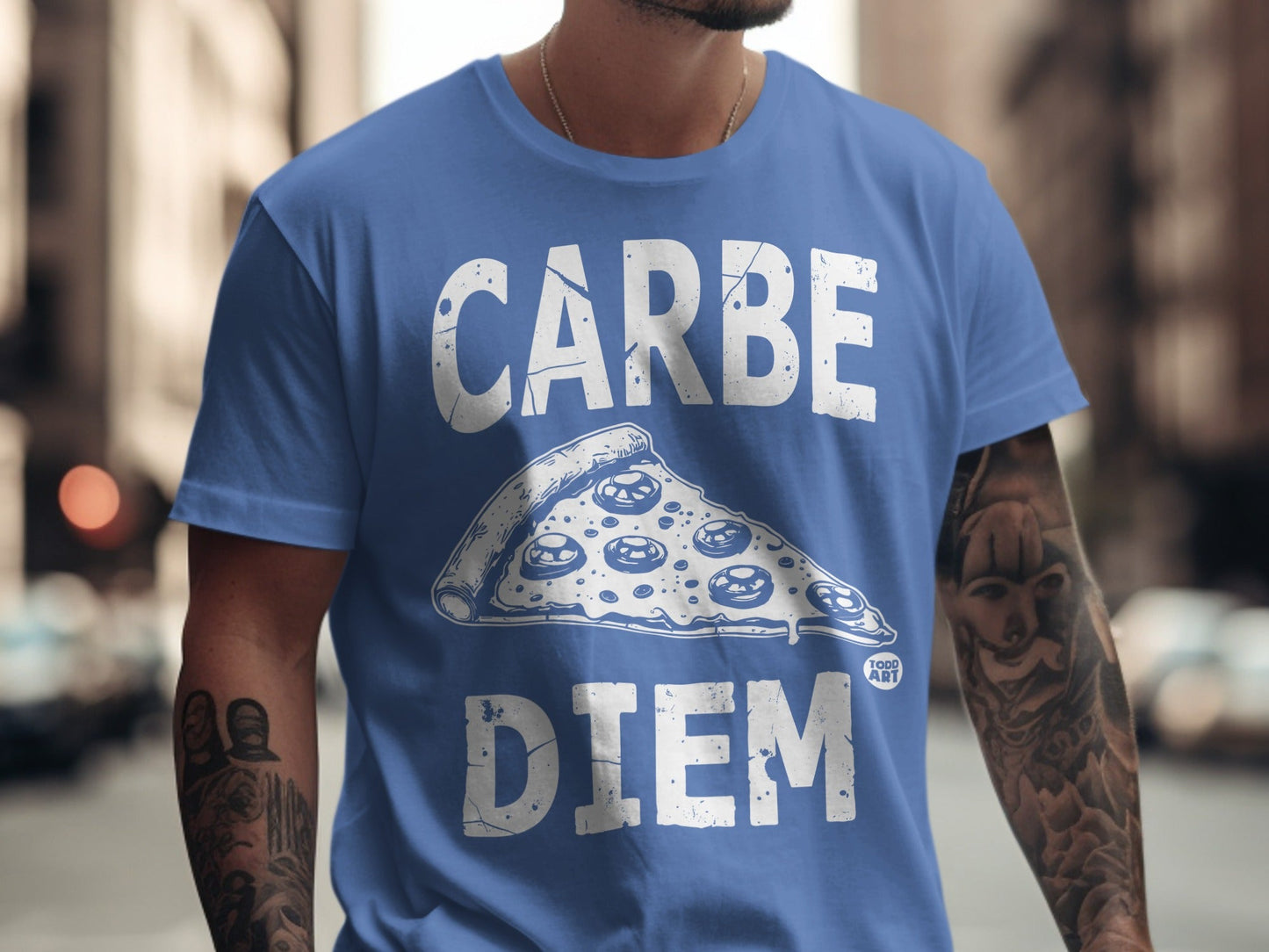 Blue t-shirt with "CARPE DIEM" and pizza slice graphic.