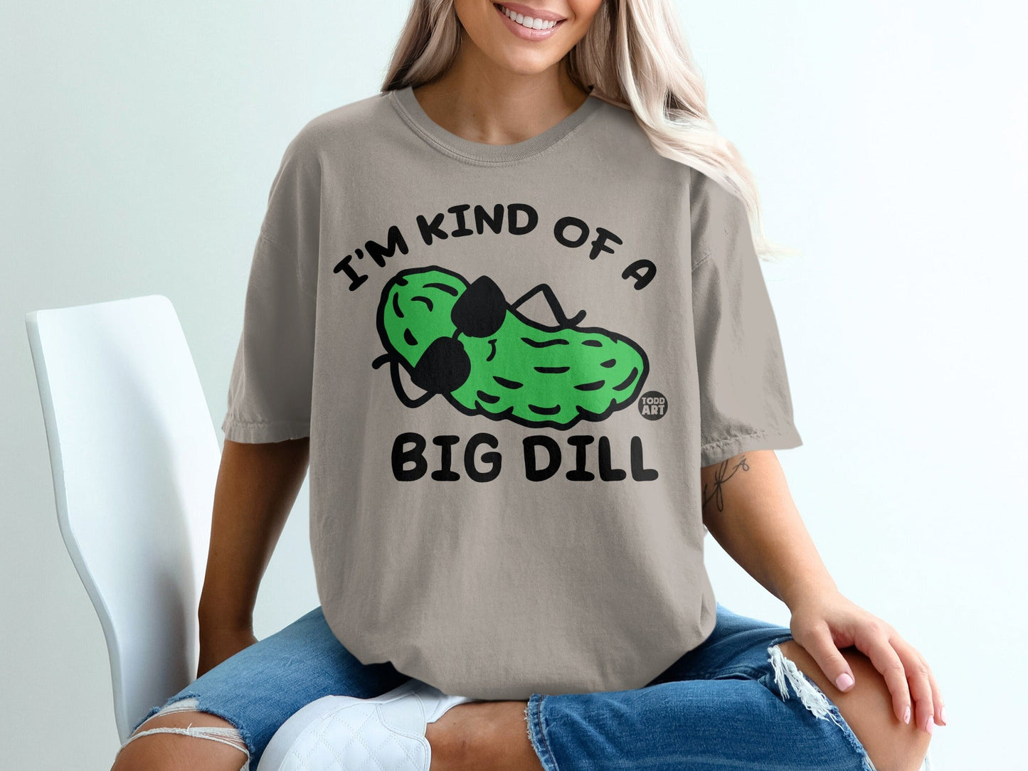 T-shirt with green pickle graphic and text "I'M KIND OF A BIG DILL".