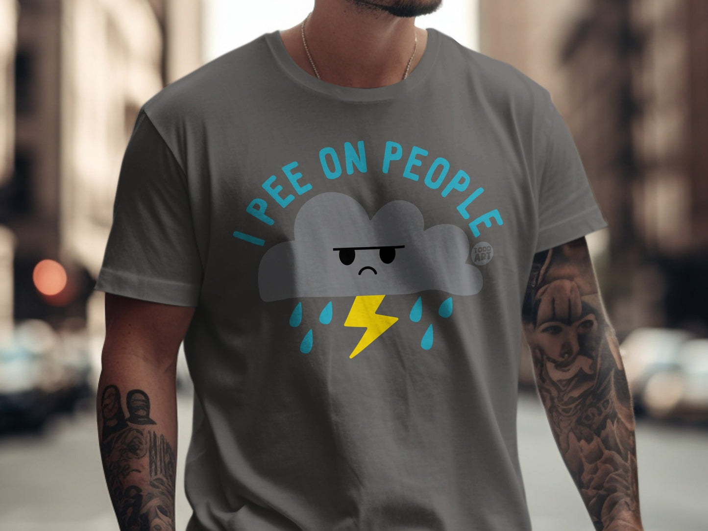 Gray t-shirt with a cartoon cloud, lightning bolt, and "I pee on people" text.