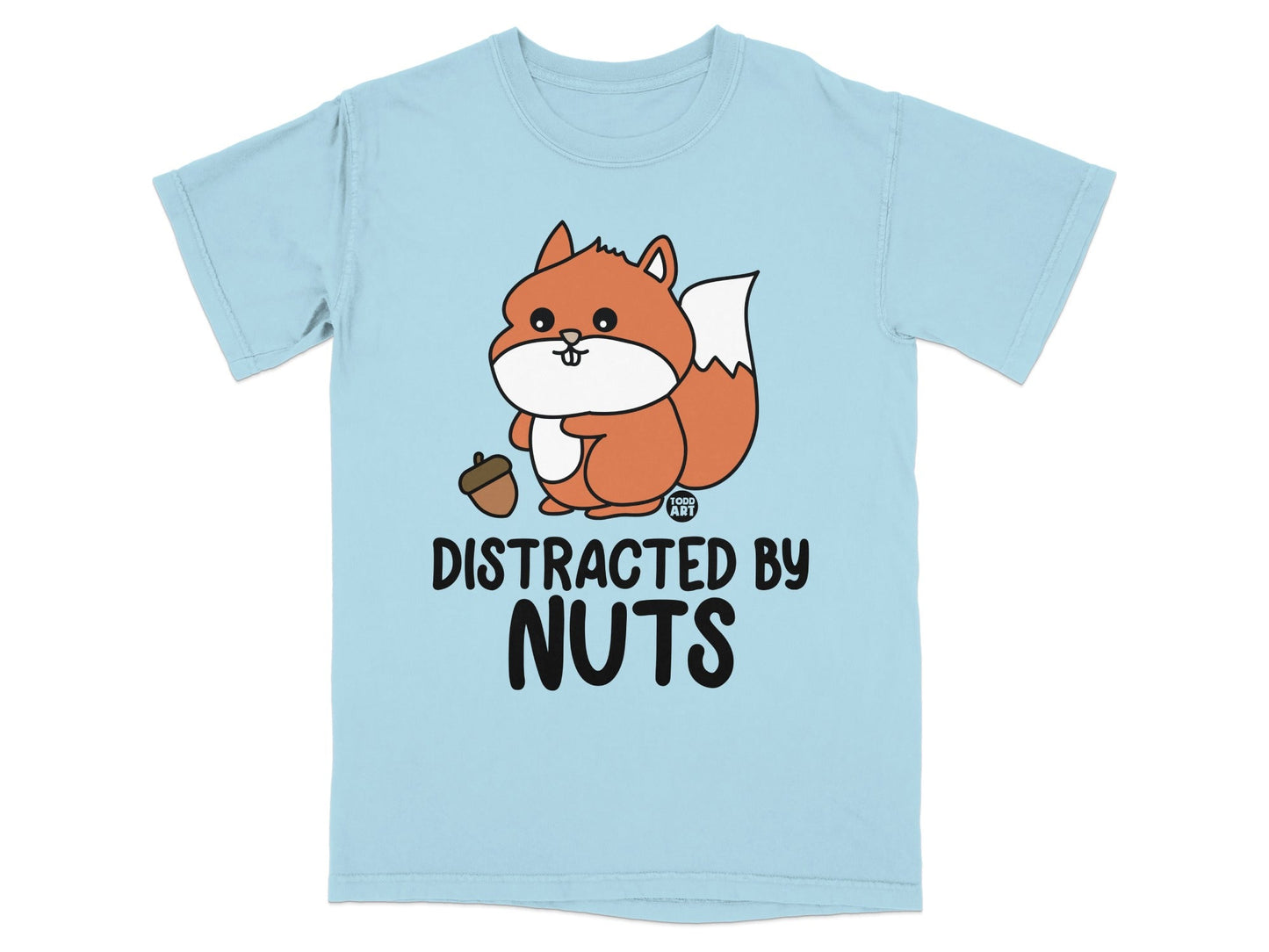 Light blue t-shirt with cartoon squirrel holding an acorn and text "DISTRACTED BY NUTS".