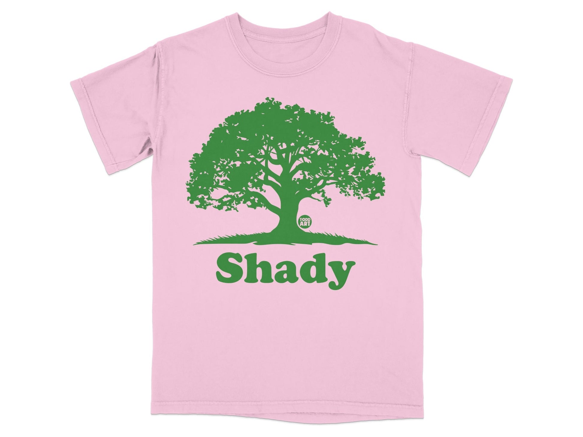 Pink t-shirt with green "Shady" text and a silhouetted tree.