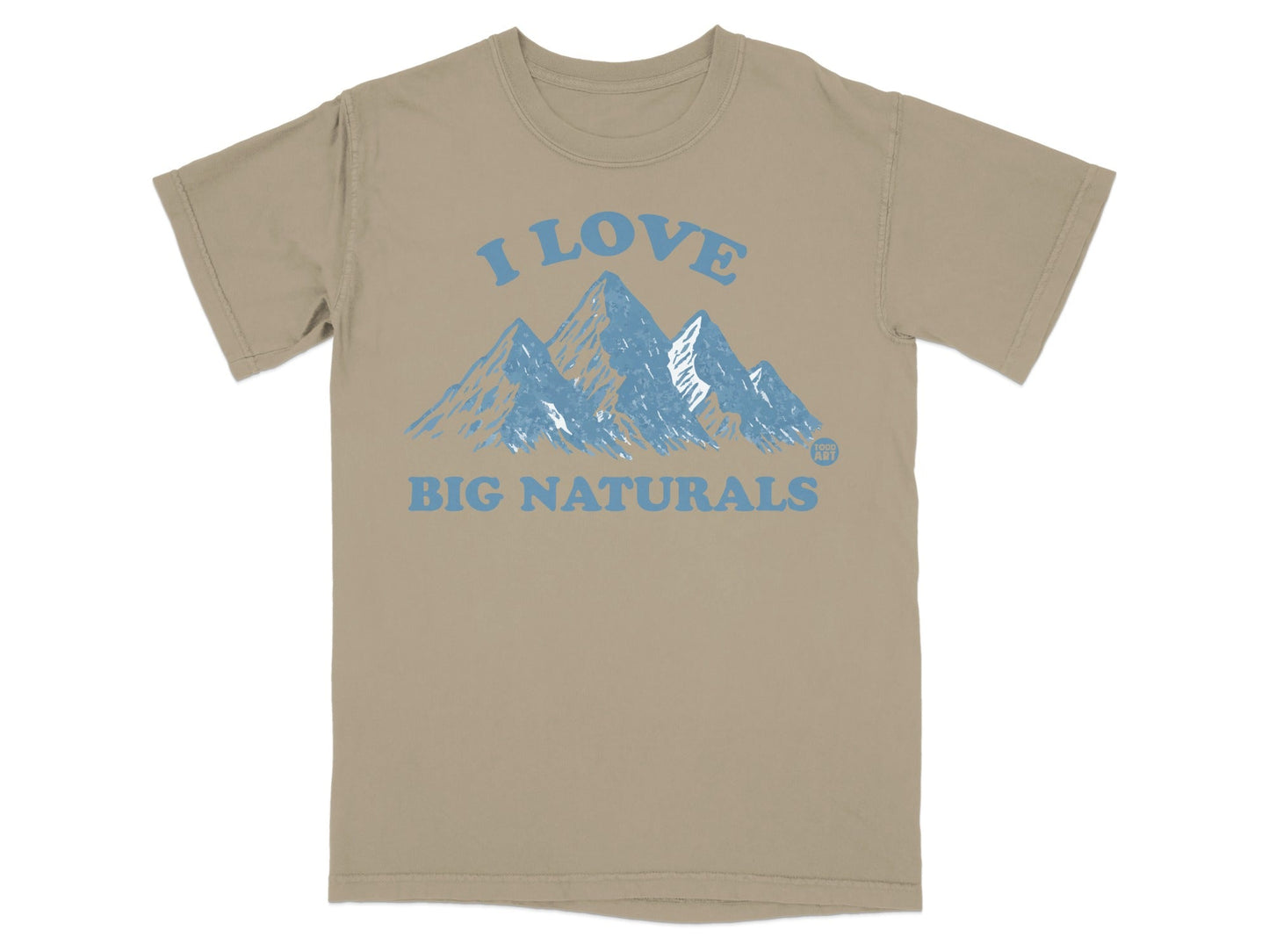 Tan t-shirt with blue mountains and text "I LOVE BIG NATURALS".