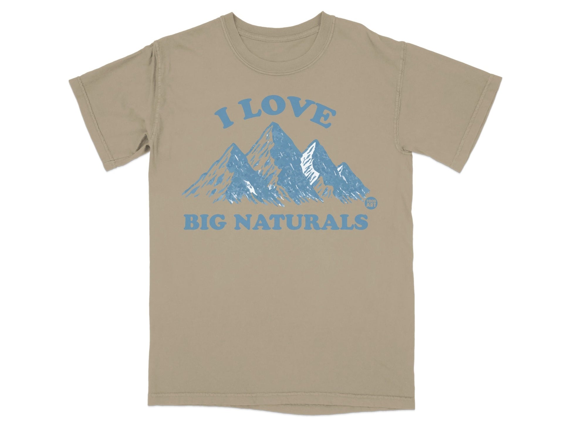 Tan t-shirt with blue mountains and text "I LOVE BIG NATURALS".