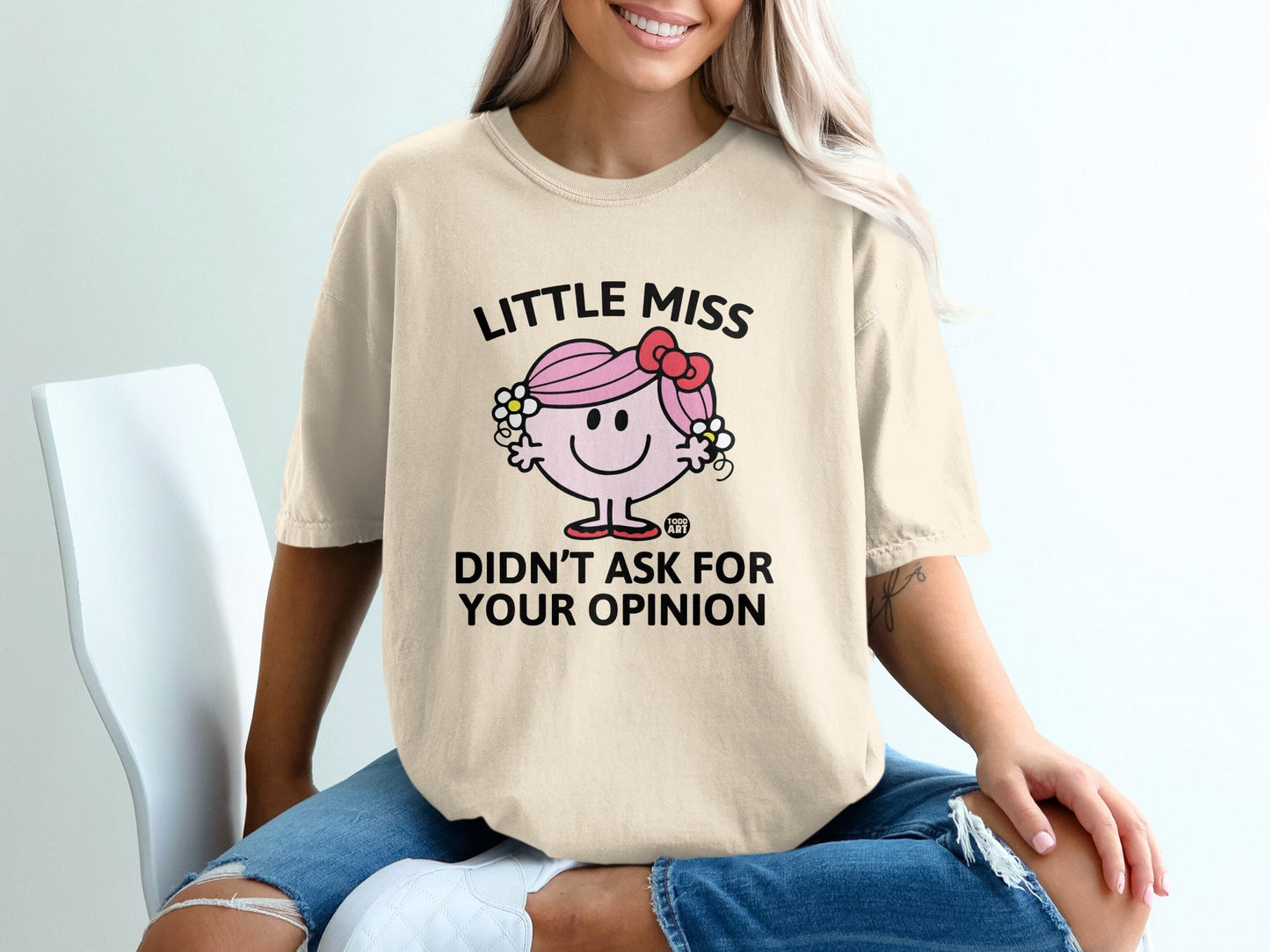 Little Miss Didn't Ask For Your Opinion graphic tee with floral accent.