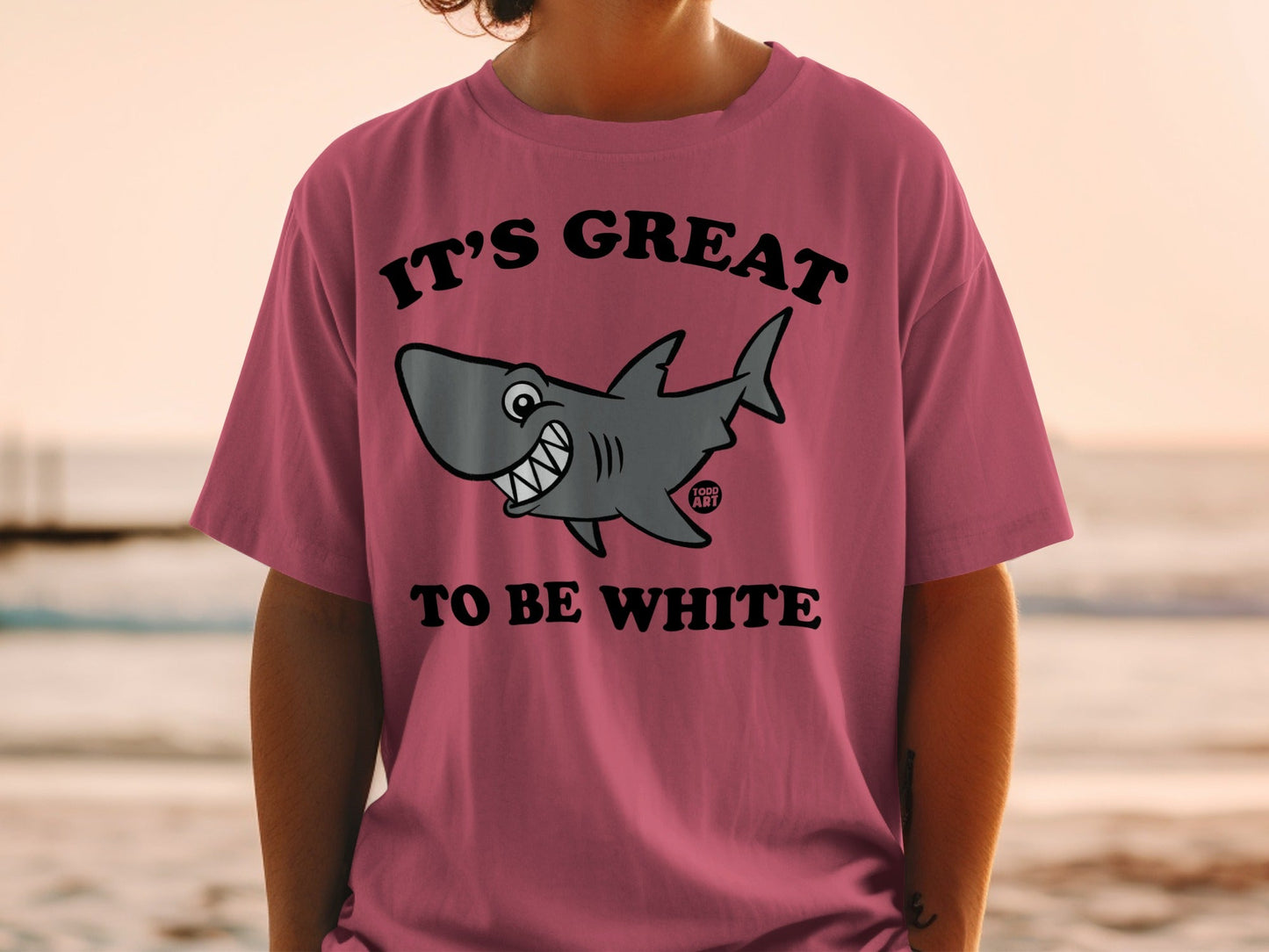 T-shirt with smiling cartoon shark and text "IT'S GREAT TO BE WHITE."