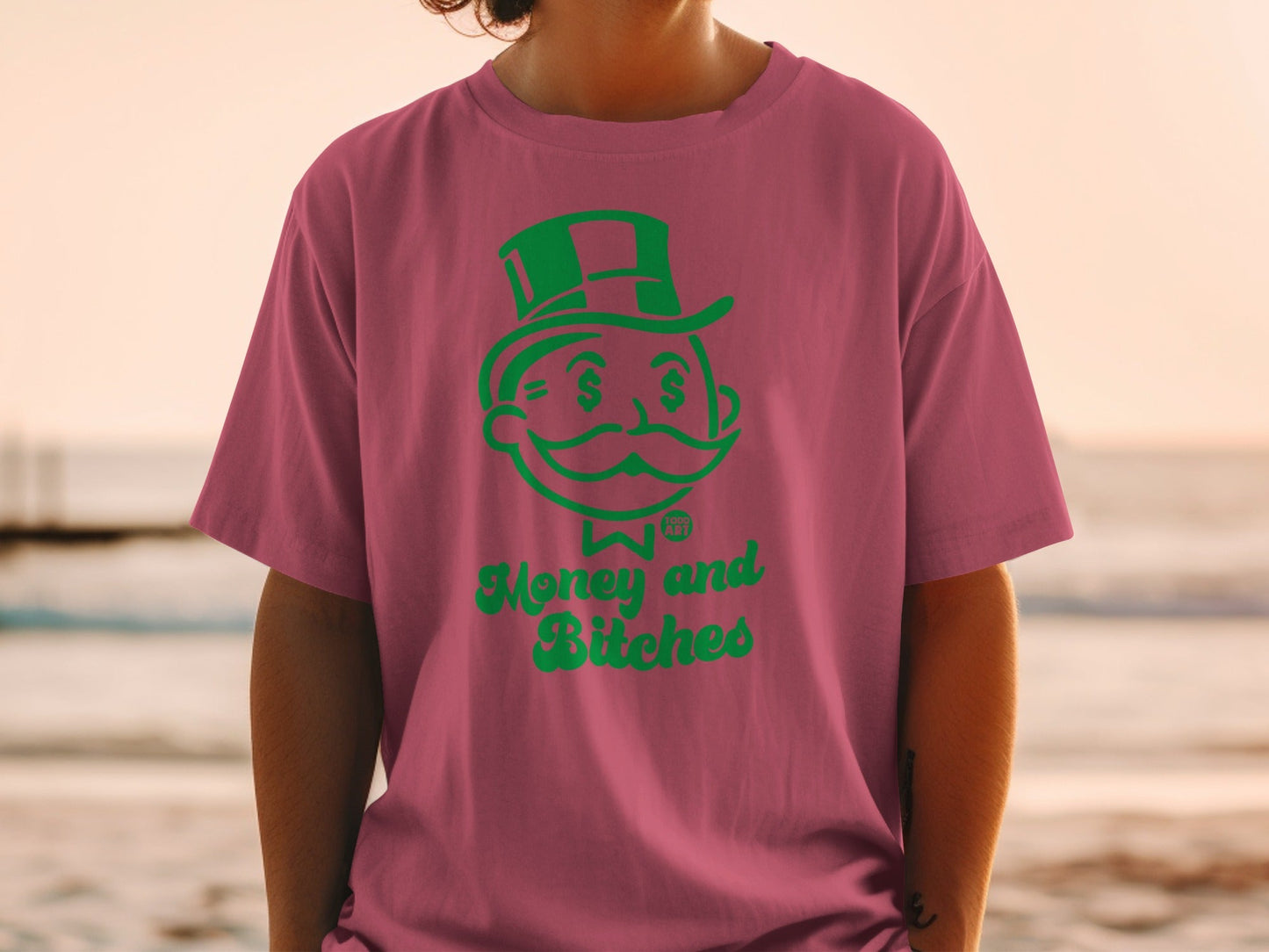 Pink t-shirt with green "Money and Bitches" text and Monopoly Man graphic.
