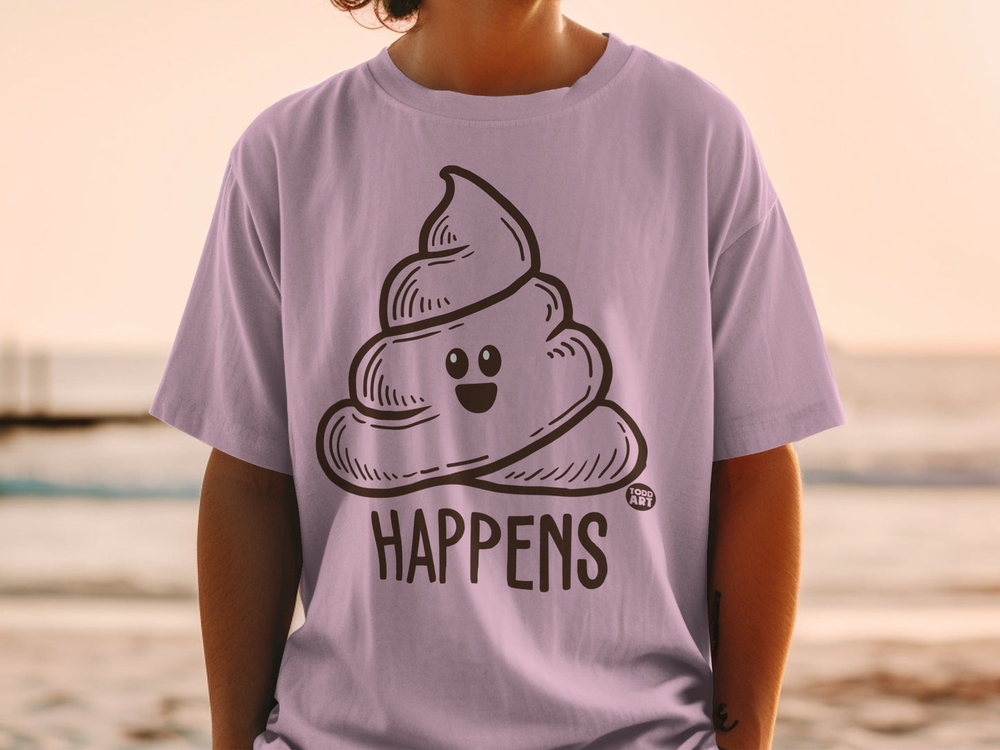 Light purple t-shirt with a smiling cartoon poop emoji and text.