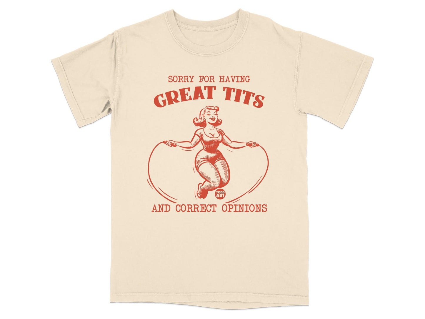 Cream t-shirt with graphic of woman jumping rope and text "SORRY FOR HAVING GREAT TITS AND CORRECT OPINIONS".