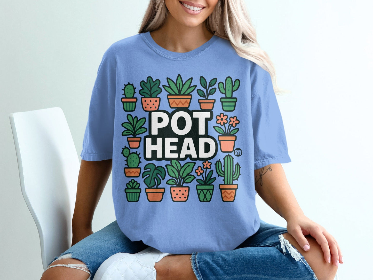 Blue t-shirt with "POT HEAD" and potted plants graphic.