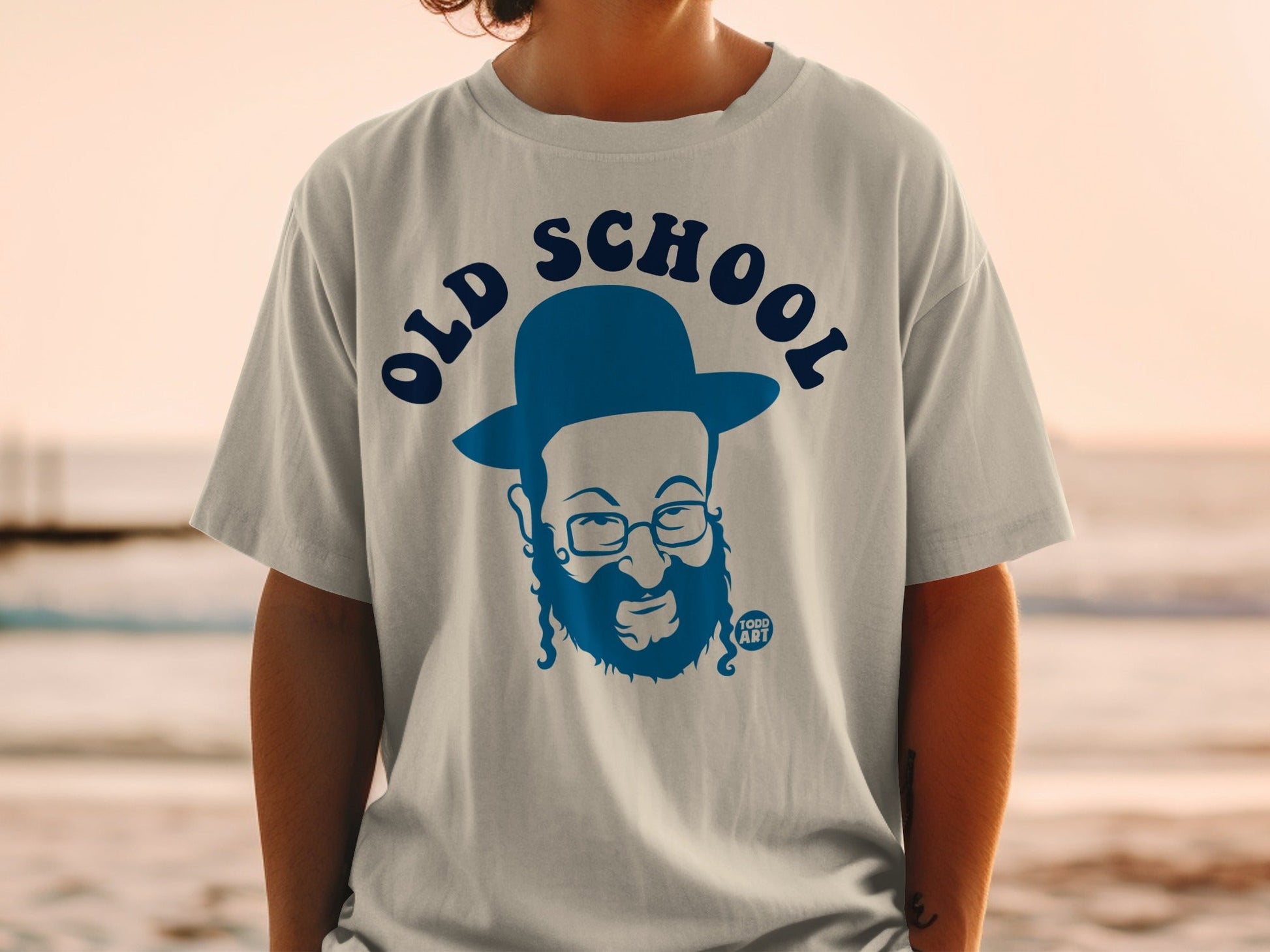 T-shirt featuring a blue cartoon portrait and "OLD SCHOOL" text.
