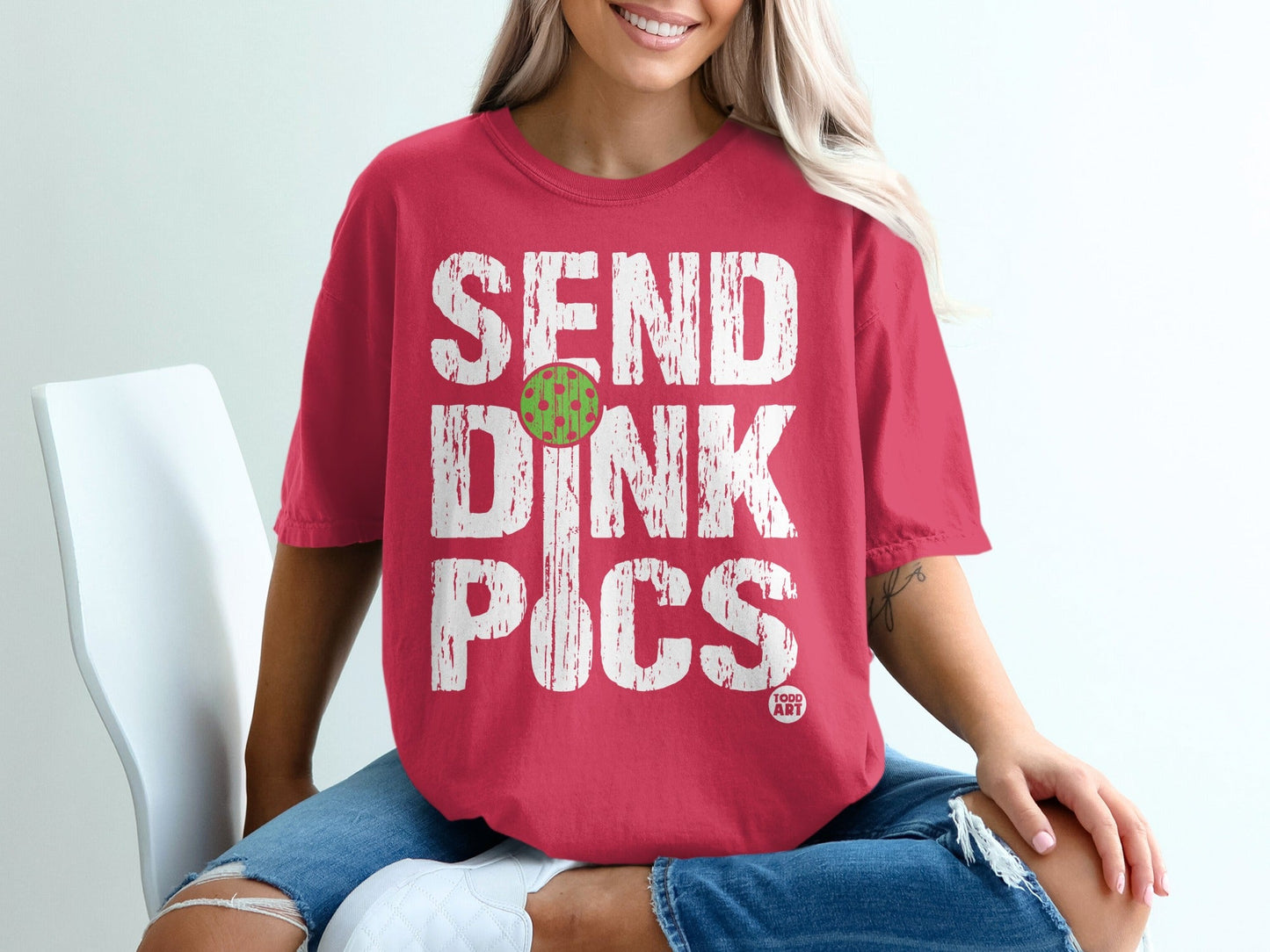Pink t-shirt with "SEND DINK PICS" and pickleball graphic.