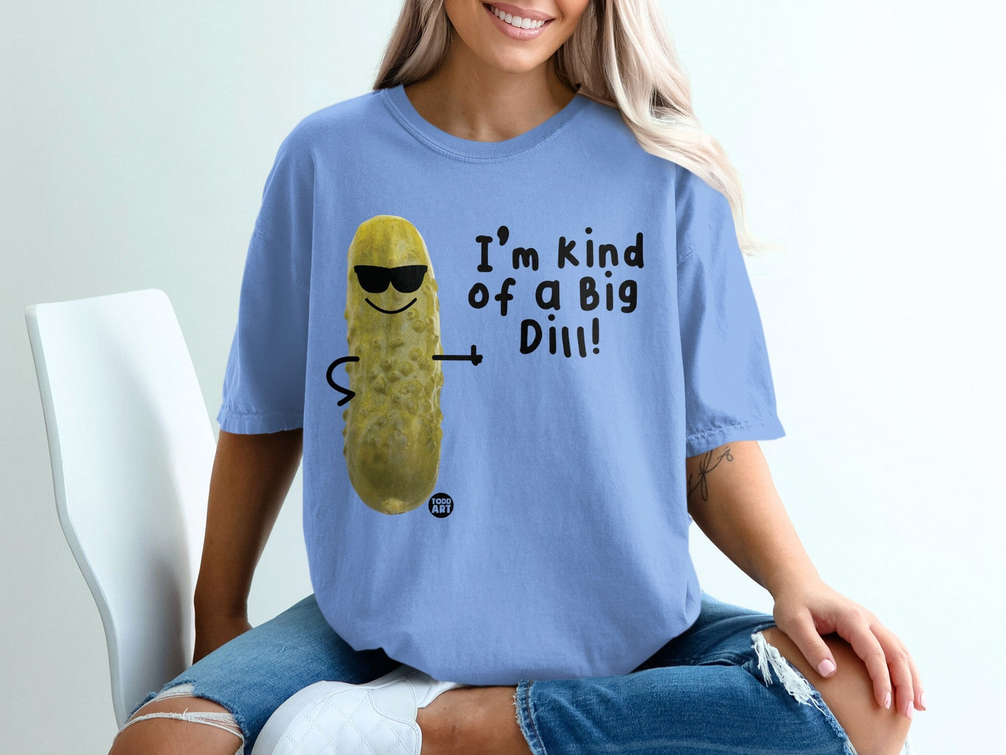 Blue t-shirt with cartoon pickle wearing sunglasses, saying "I'm kind of a Big Dill!"