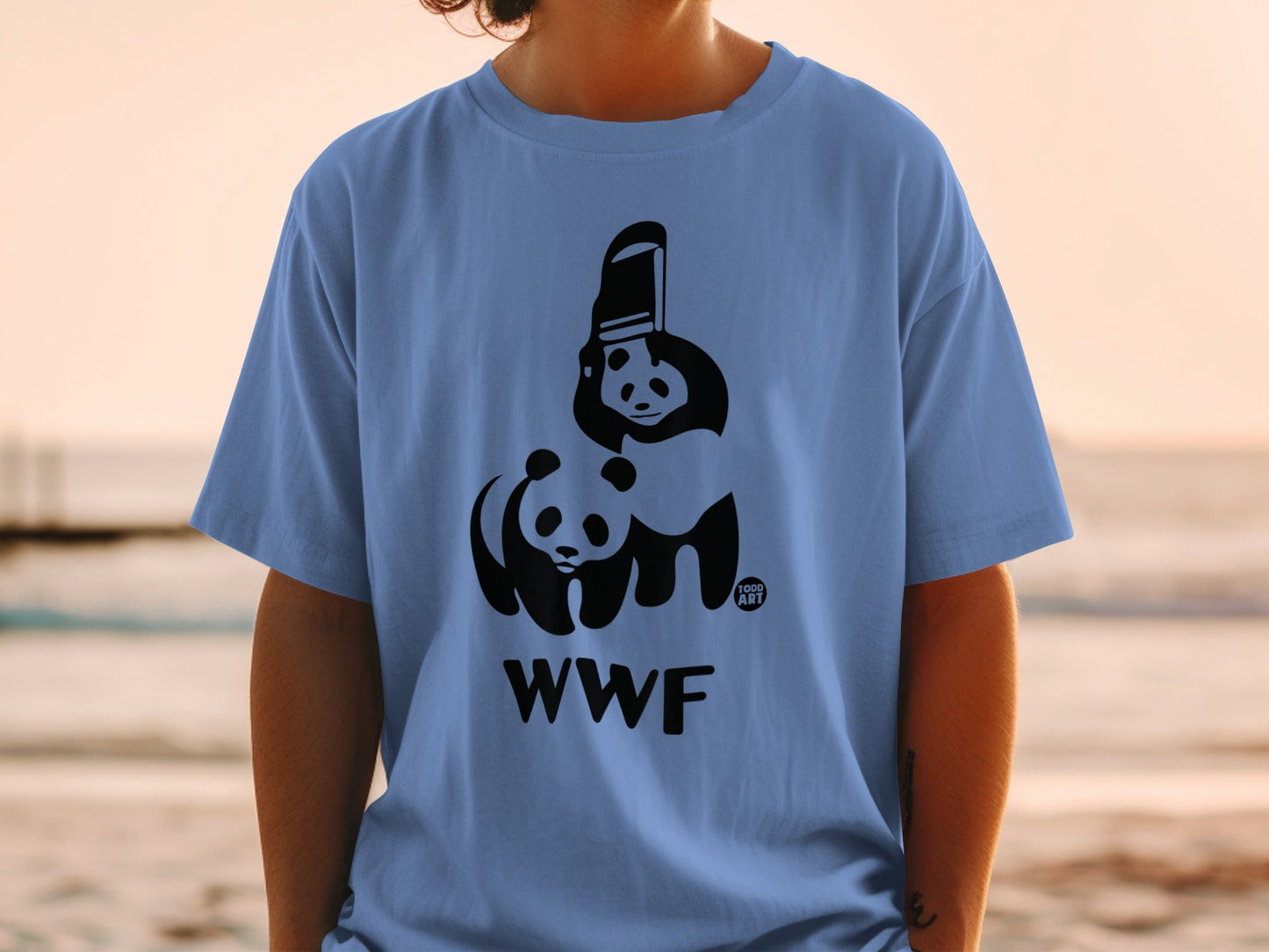 Blue t-shirt with WWF logo featuring two pandas and camera.