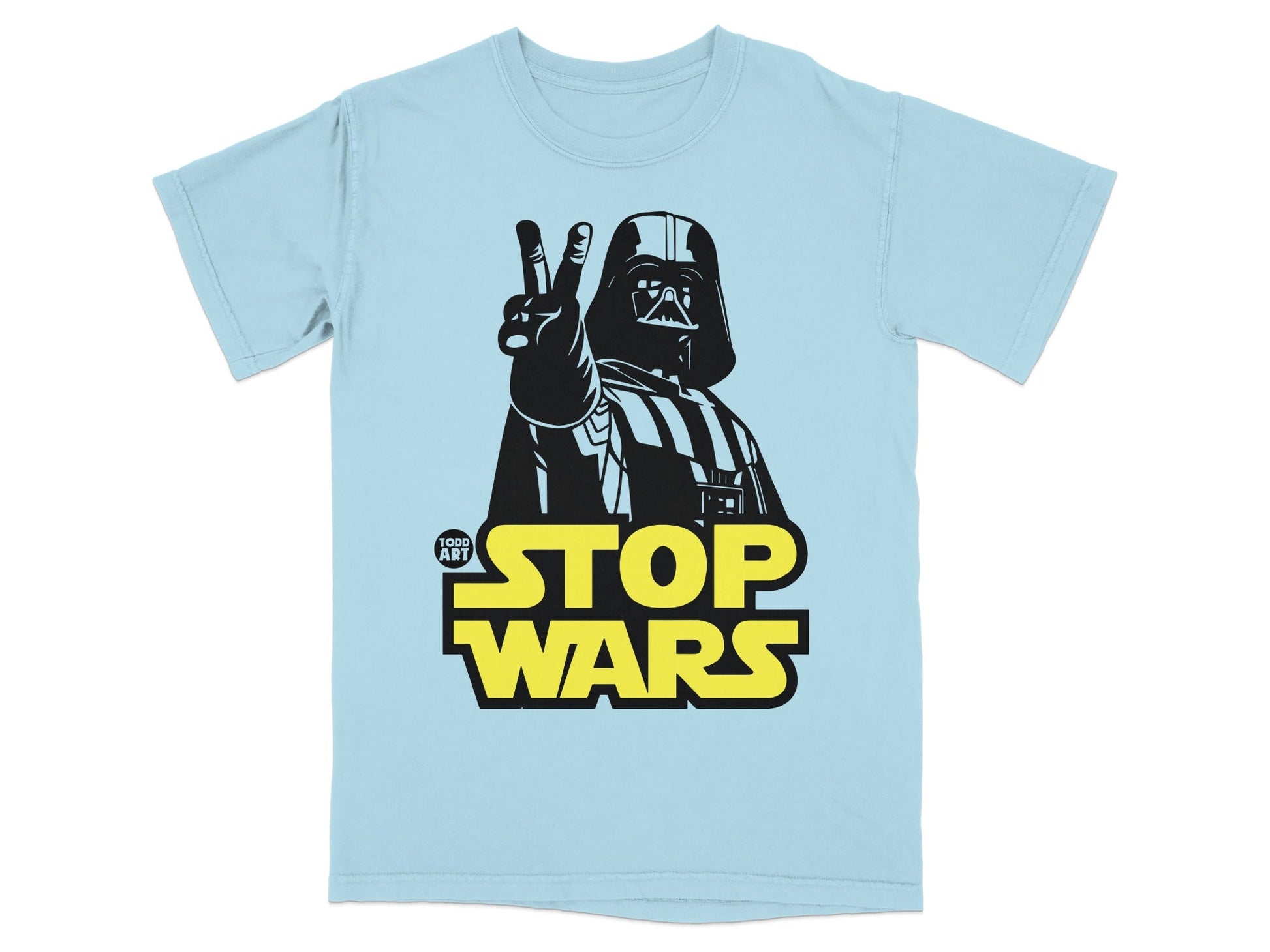Light blue t-shirt with Darth Vader giving peace sign and "STOP WARS" text.
