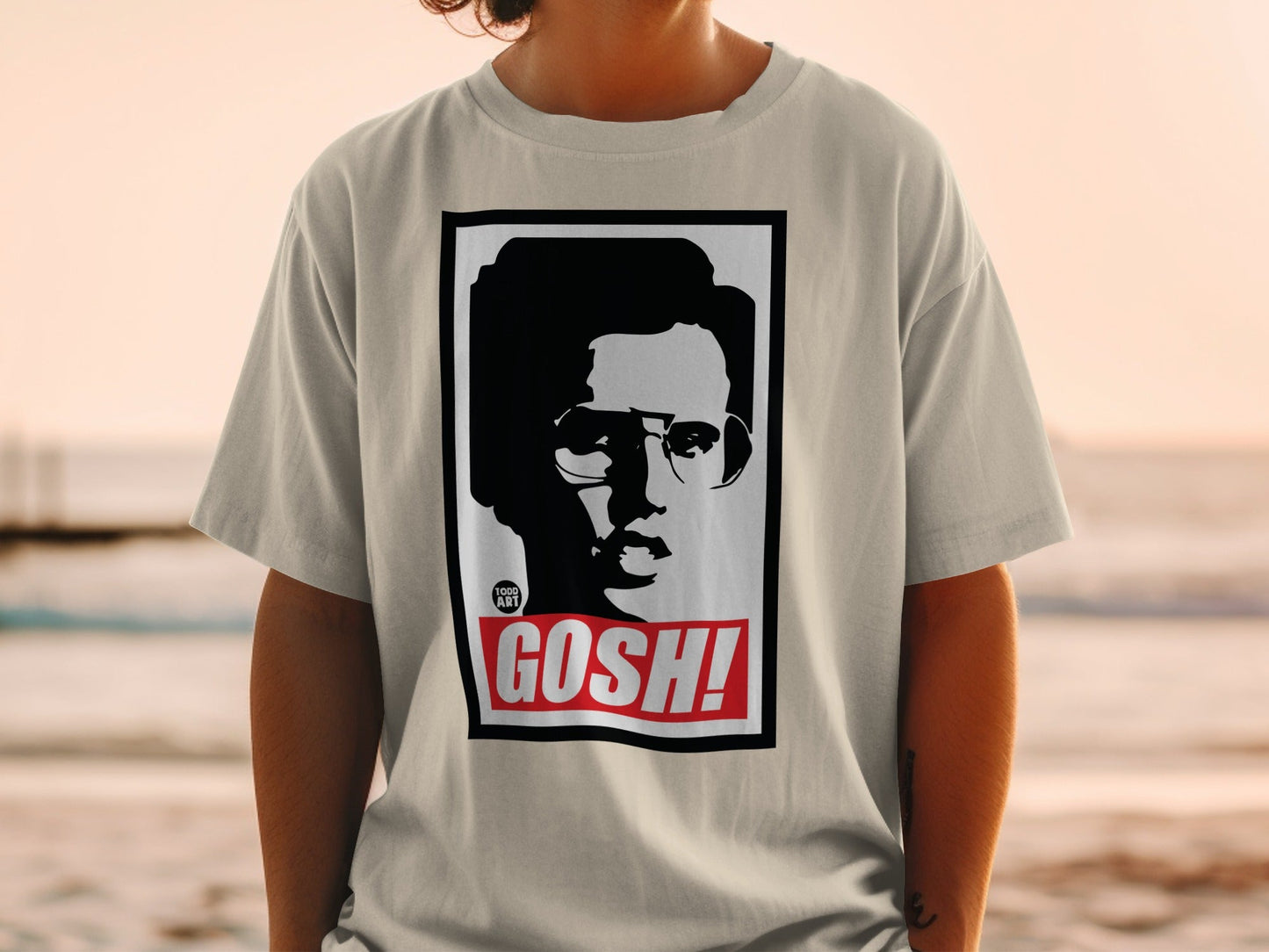 T-shirt with black and white portrait and "GOSH!" text.