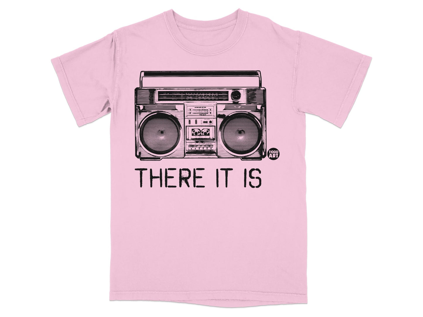 Pink t-shirt with a black graphic of a boombox and the text "THERE IT IS".