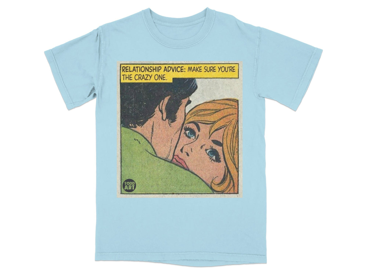 Light blue t-shirt with a comic panel illustration of a couple and text.