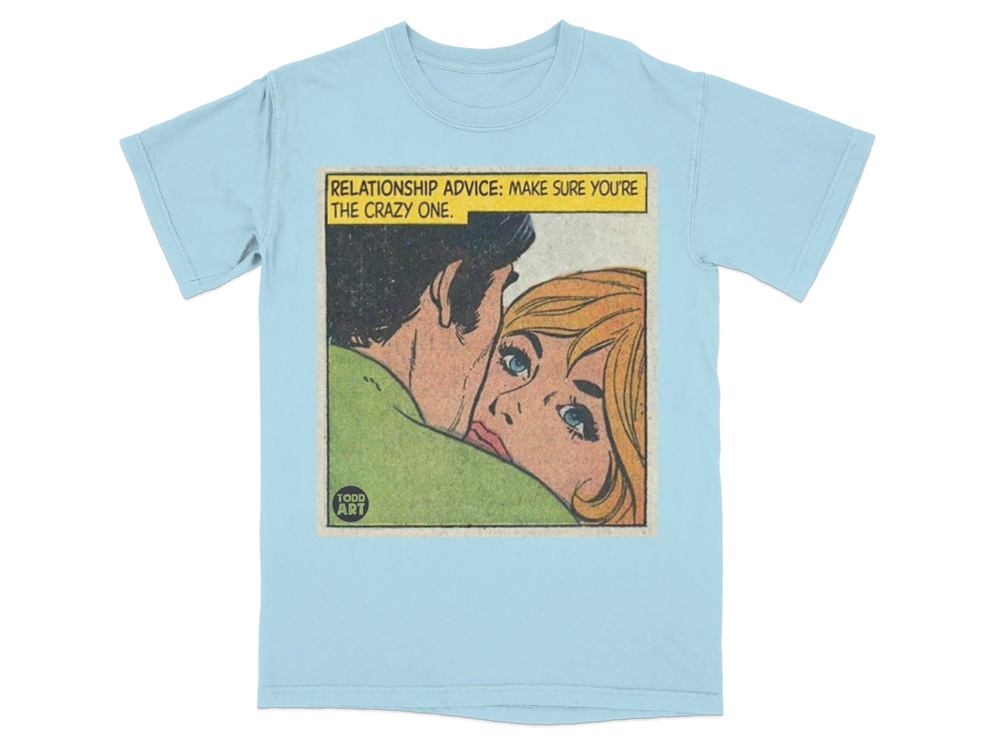 Light blue t-shirt with a comic panel illustration of a couple and text.