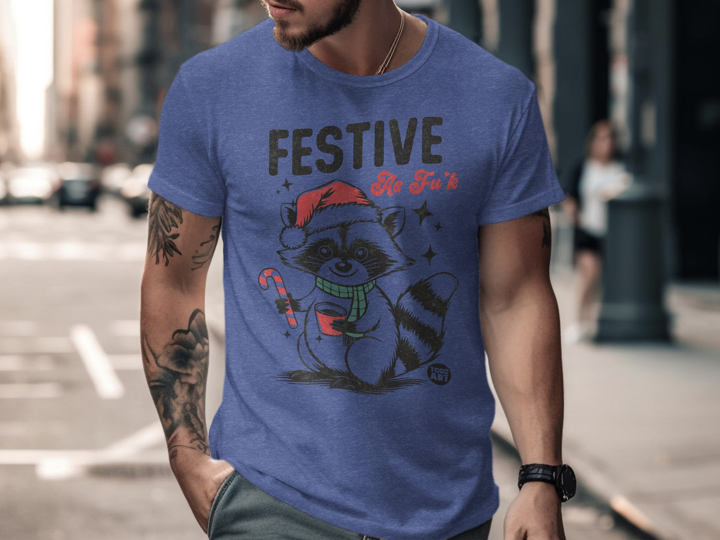 Festive Raccoon Shirt with a Christmas Hat and Candy Cane