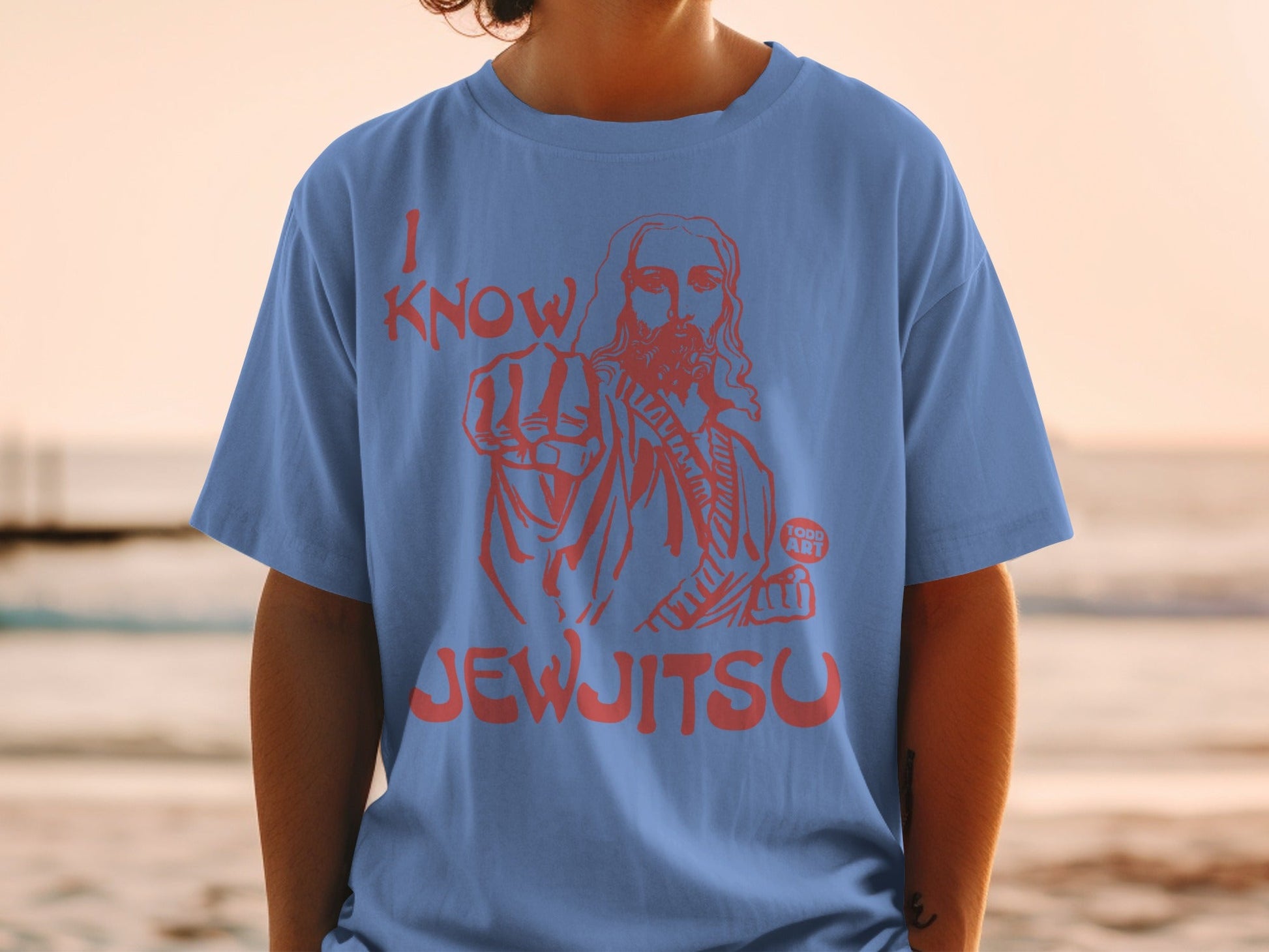 Blue t-shirt with "I KNOW JEWJITSU" and Jesus pointing forward.