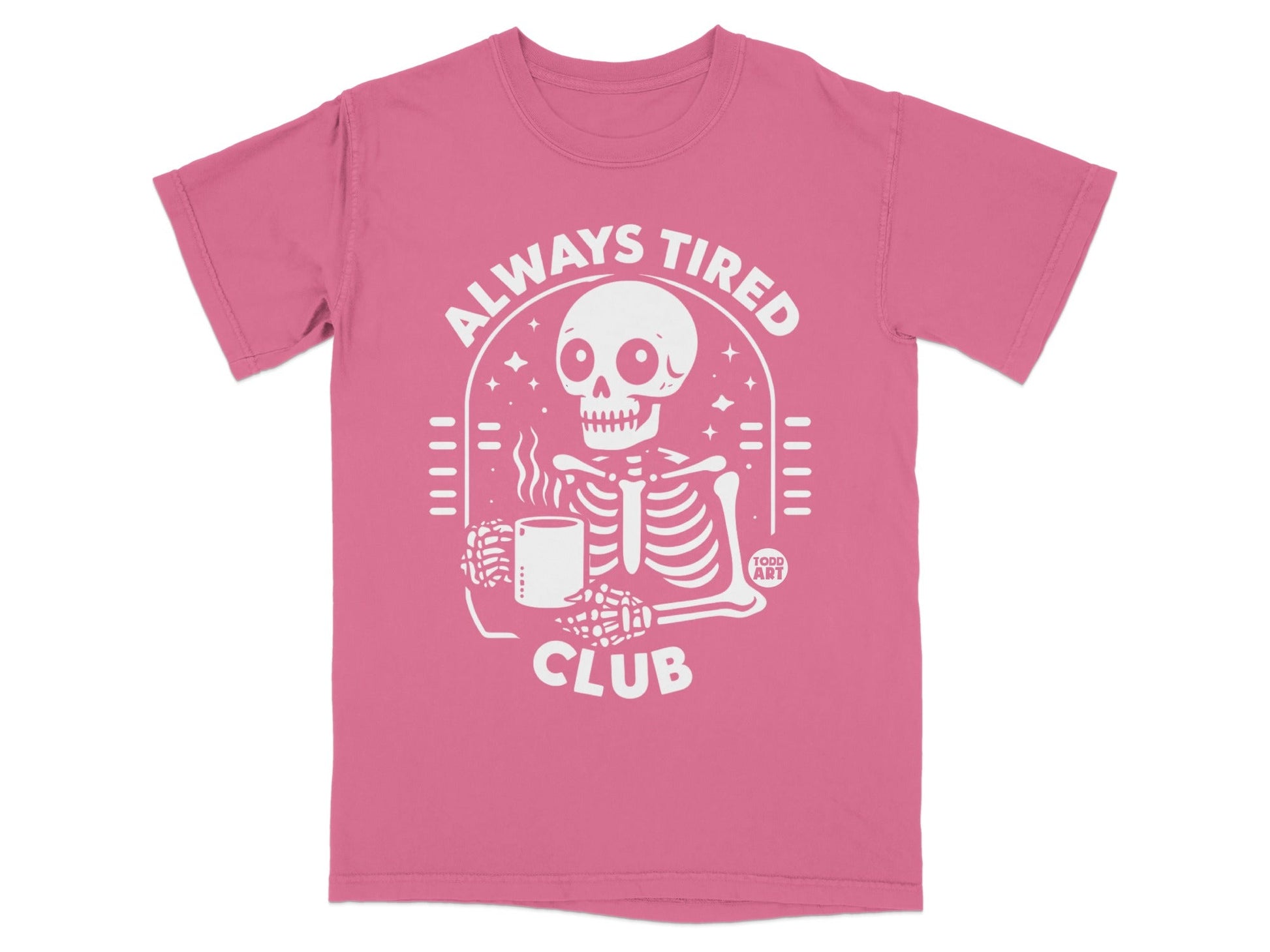 Pink t-shirt with "Always Tired Club" skeleton holding coffee, "Todd Art" logo.