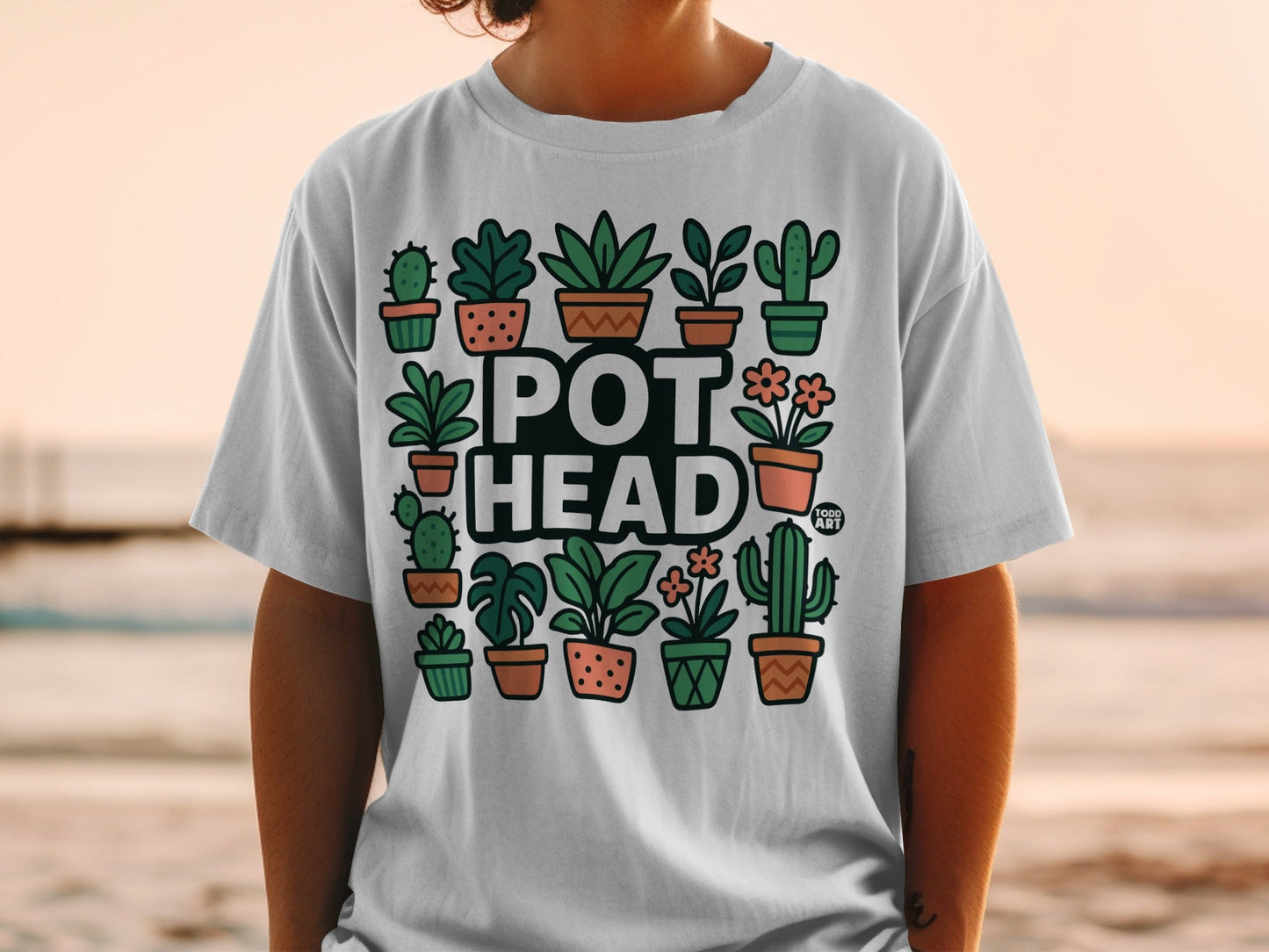 White t-shirt featuring a collection of cartoon potted plants and the text "POT HEAD".