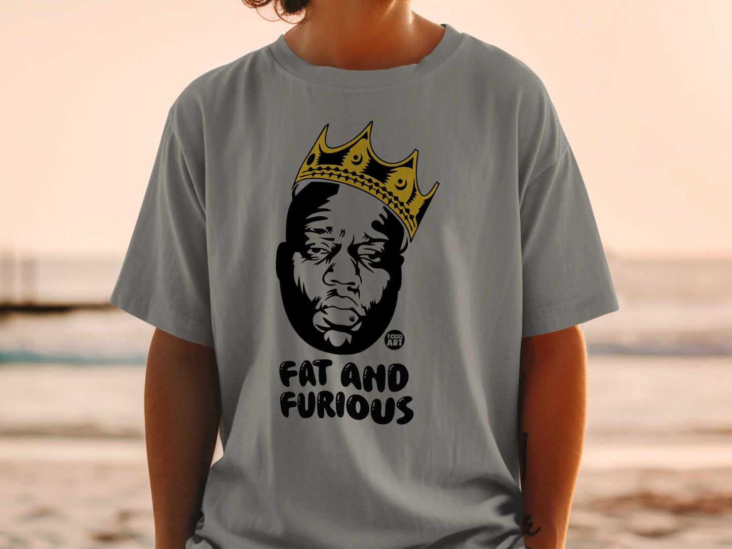 T-shirt with black and white king portrait and "Fat and Furious" text.