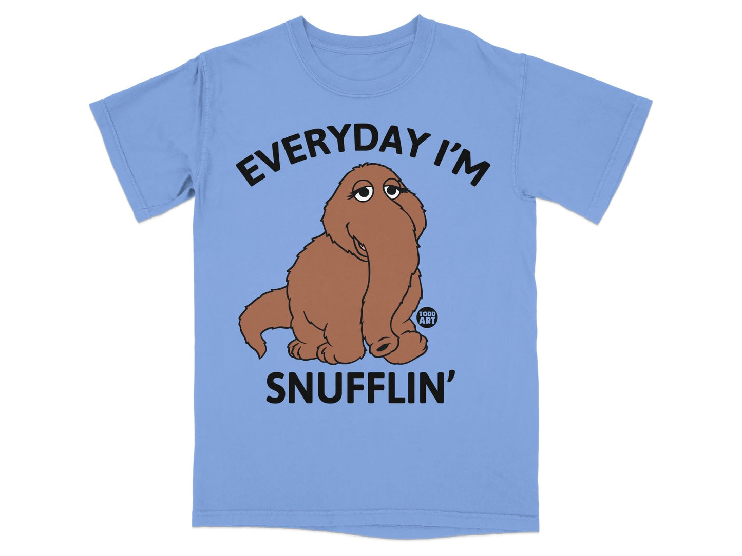 Light blue t-shirt with brown furry creature and text "EVERYDAY I'M SNUFFLIN'".