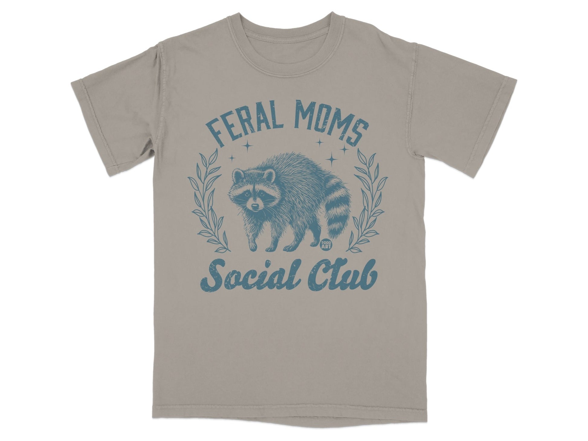 T-shirt with raccoon and "Feral Moms Social Club" text.