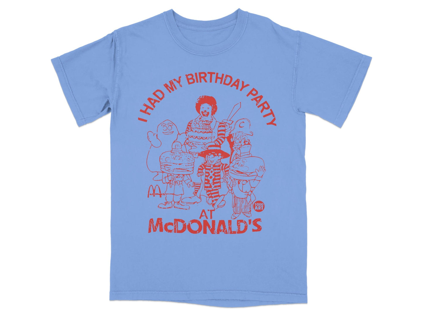 Light blue t-shirt with red graphic of McDonald's characters and "I HAD MY BIRTHDAY PARTY AT MCDONALD'S".