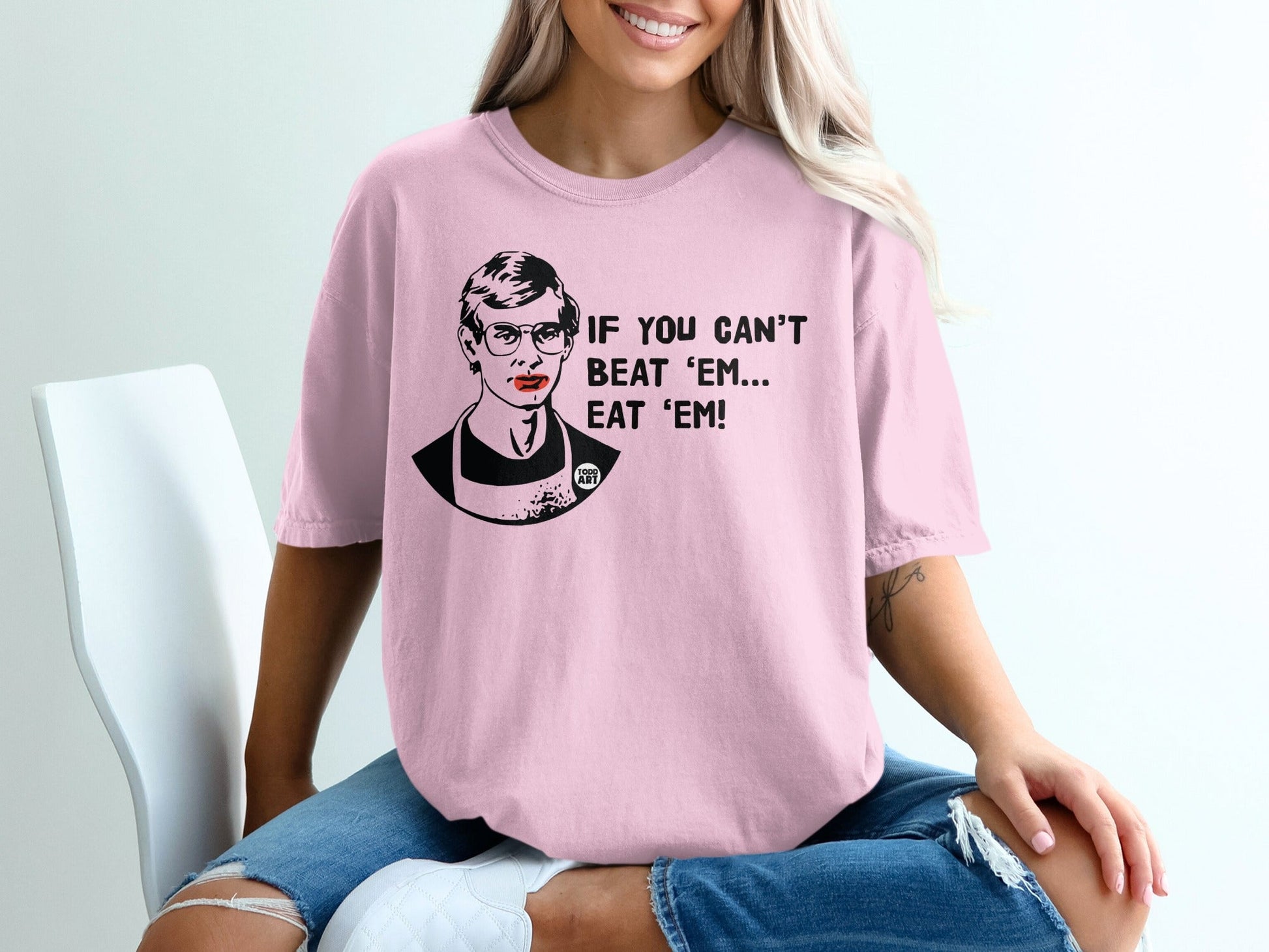 Pink t-shirt with Ruth Bader Ginsburg illustration and "If you can't beat 'em... eat 'em!" text.