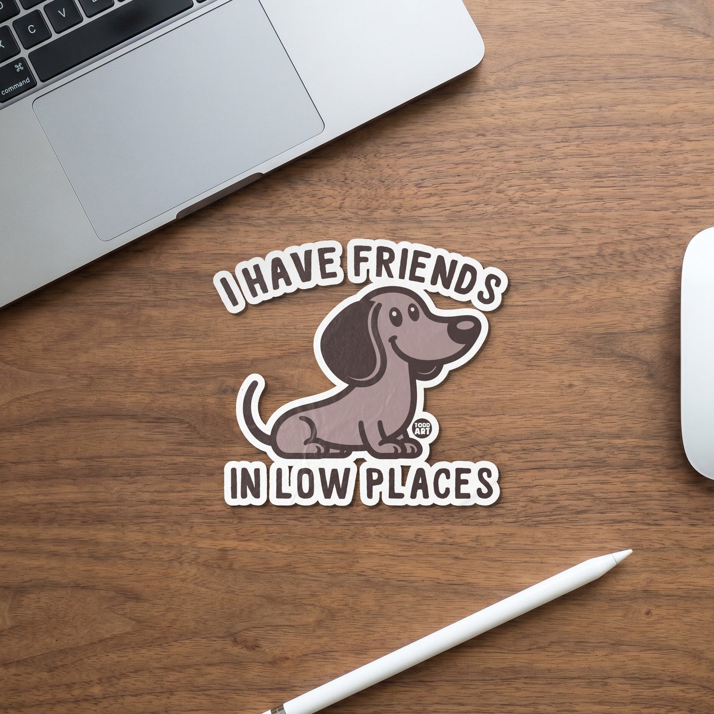 Dachshund sticker reading "I HAVE FRIENDS IN LOW PLACES".