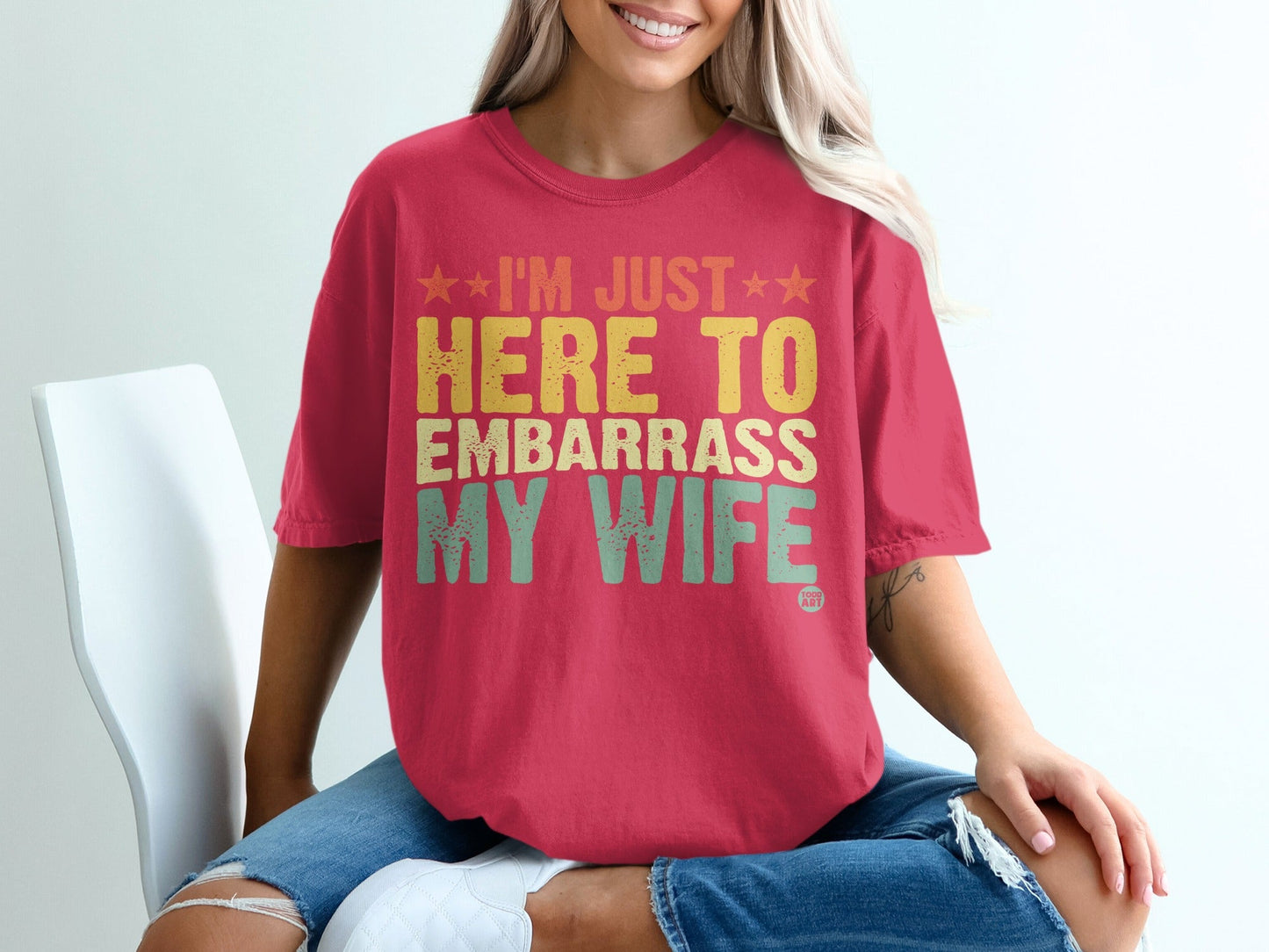 I'M JUST HERE TO EMBARRASS MY WIFE Graphic T-Shirt
