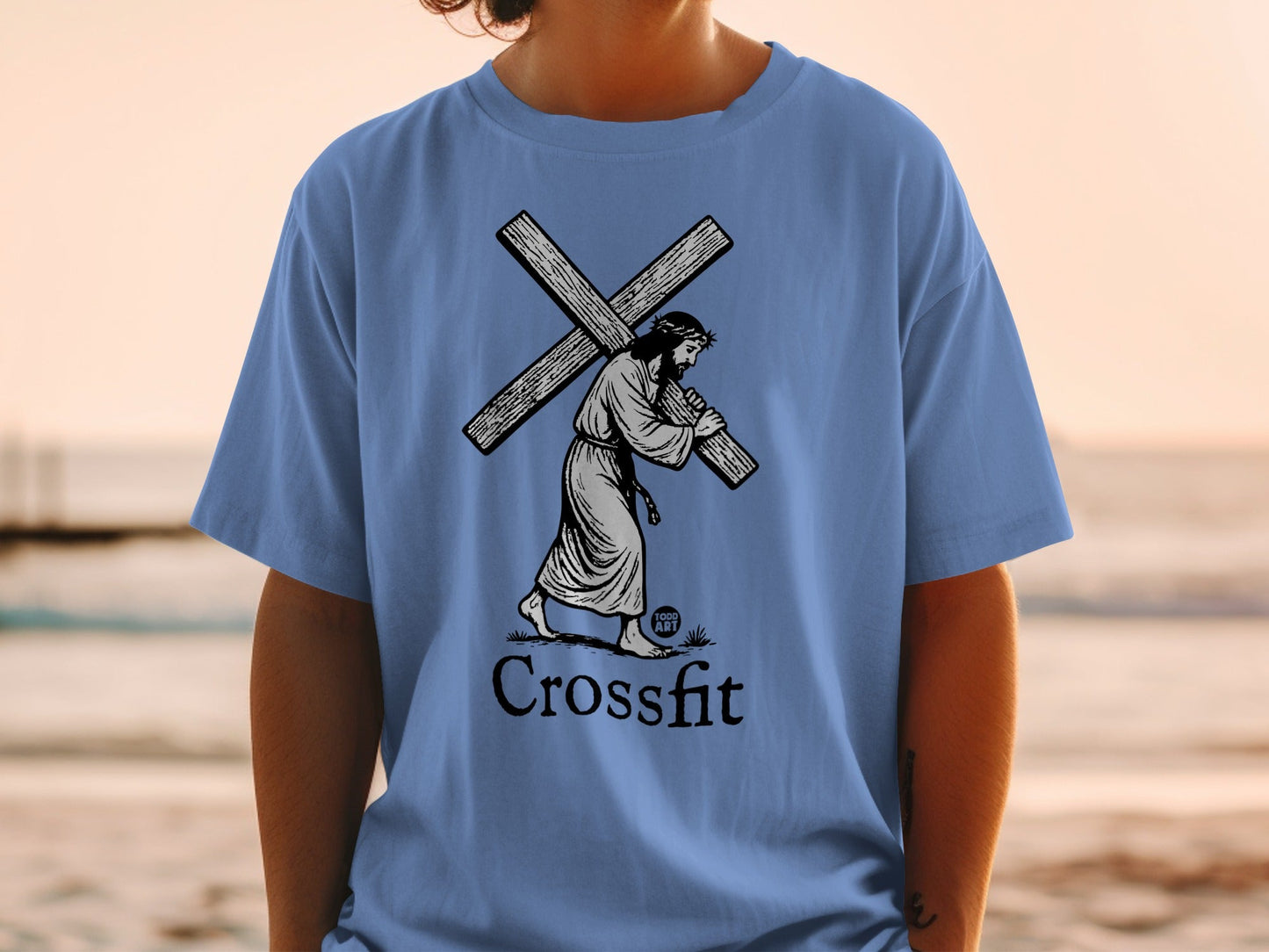 Jesus carrying the cross, with "Crossfit" text below.