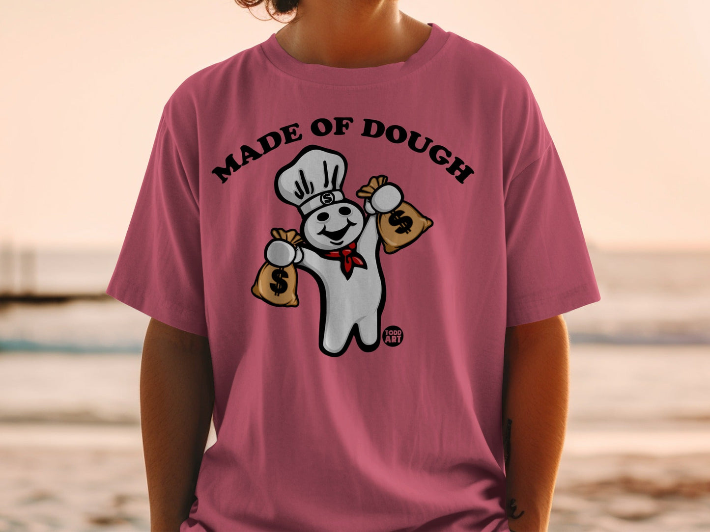 Pillsbury Doughboy with money bags wearing a chef hat, "Made of Dough" text.