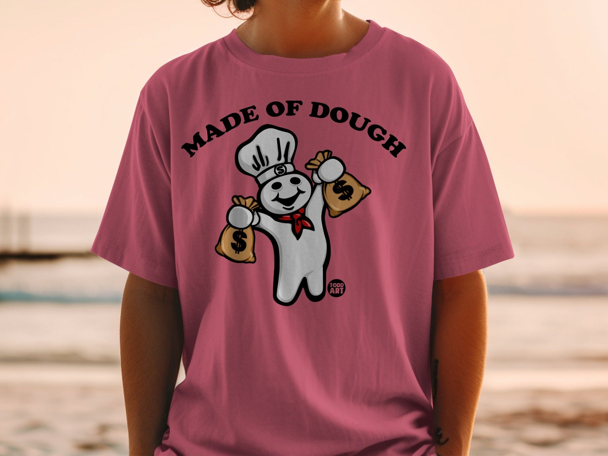 Pillsbury Doughboy with money bags wearing a chef hat, "Made of Dough" text.