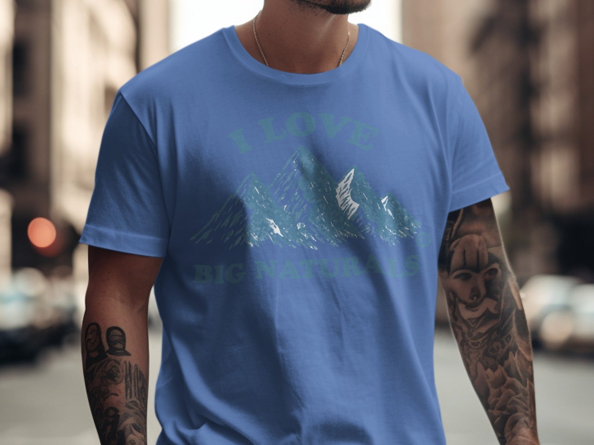 Blue t-shirt with "I LOVE BIG NATURALS" and mountain graphic.