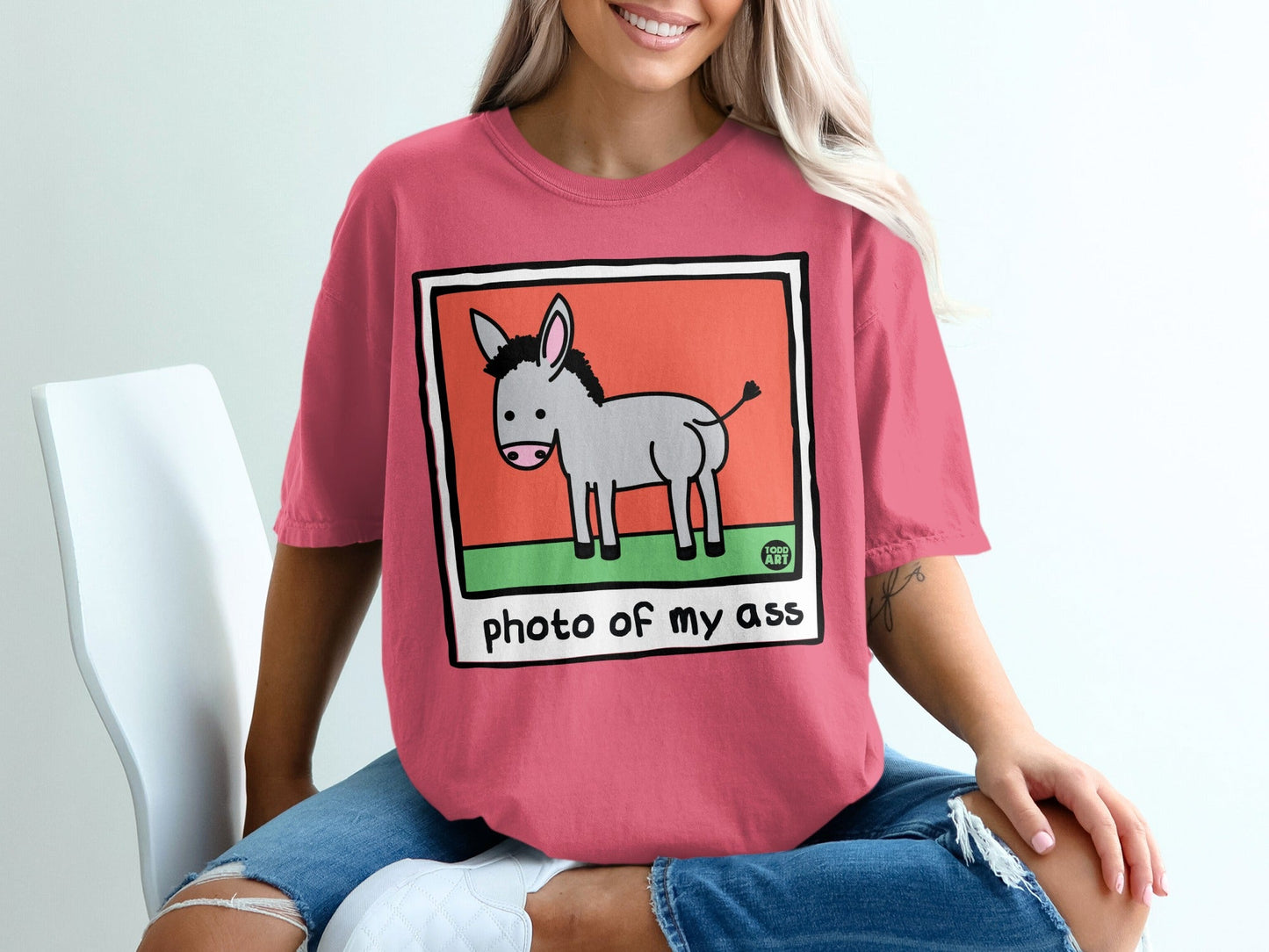 Pink t-shirt with cartoon donkey graphic and "photo of my ass" text.
