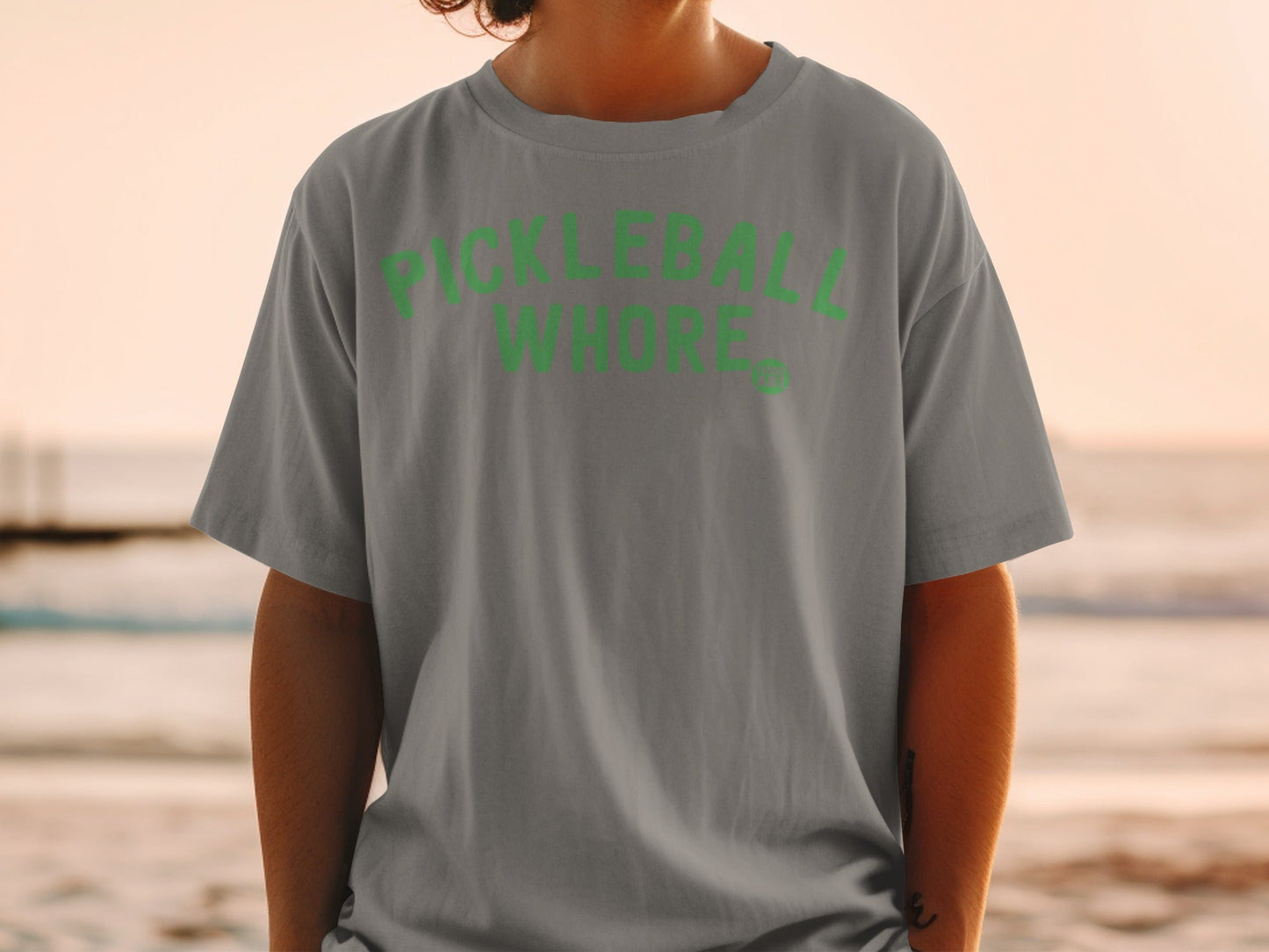 Grey t-shirt with green "PICKLEBALL WHORE" text and logo.