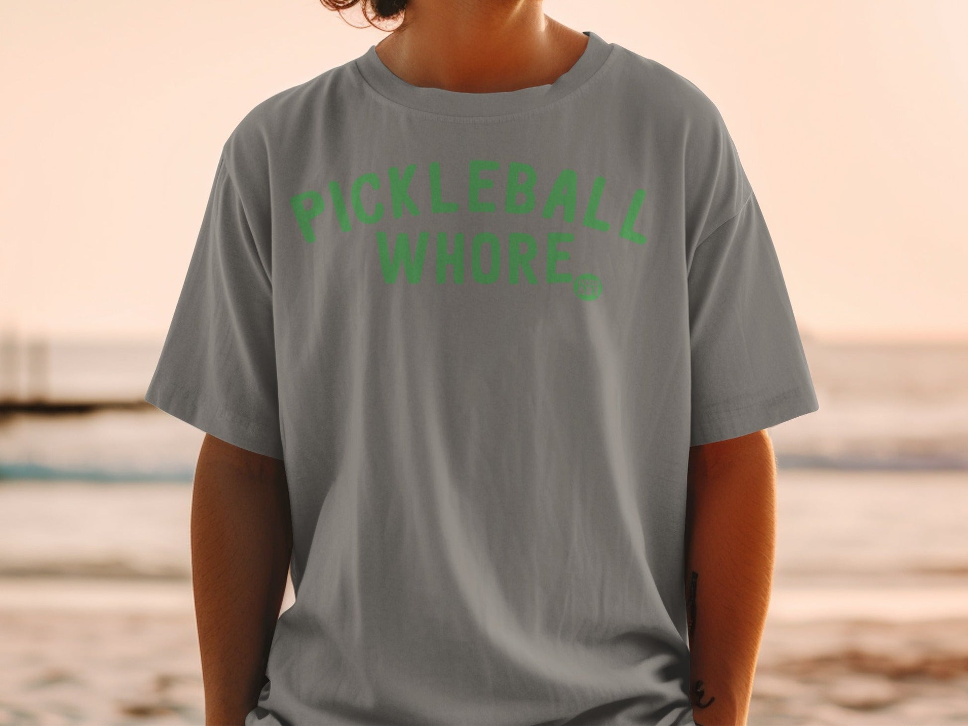 Grey t-shirt with green "PICKLEBALL WHORE" text and logo.