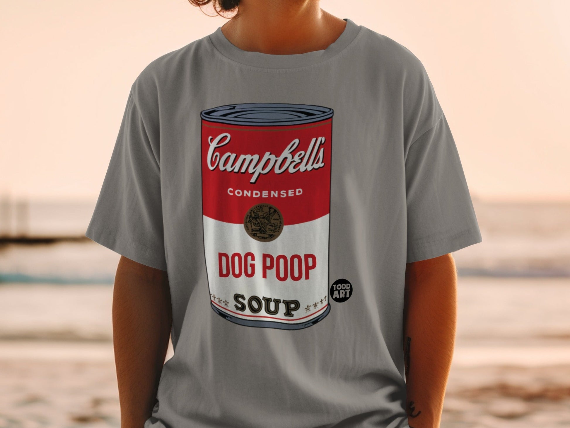 Gray t-shirt with a Campbell's Soup can design featuring "DOG POOP SOUP" and "TODD ART".