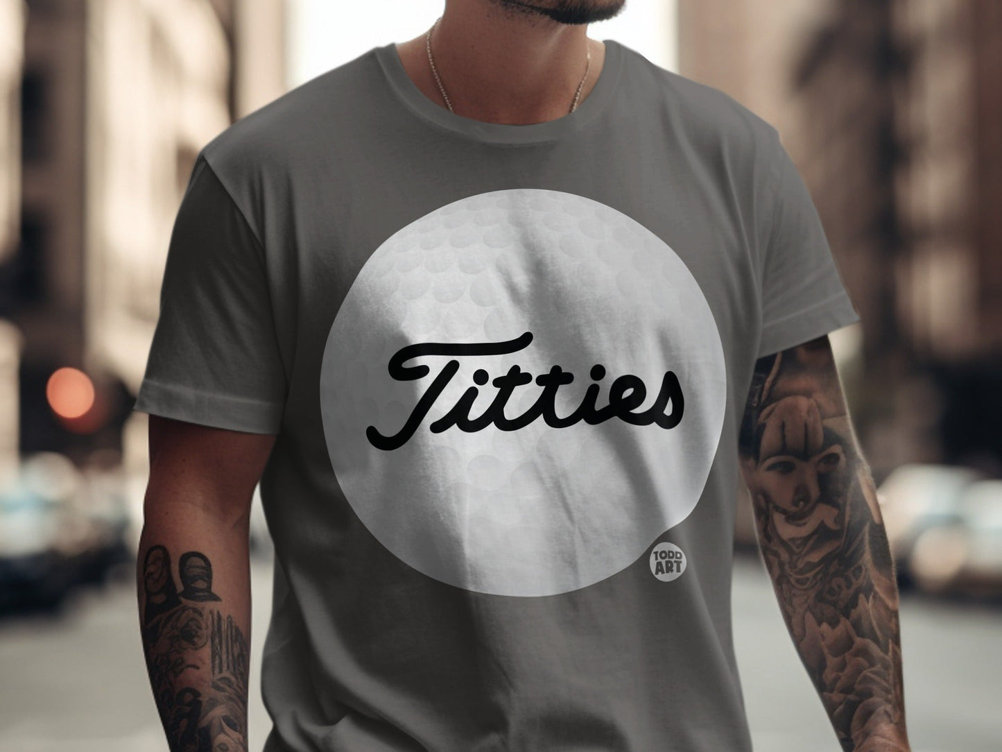 Gray t-shirt with "Bitties" graphic on a golf ball.