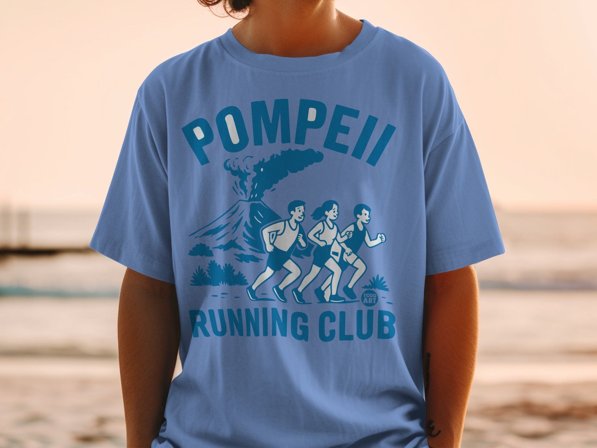 Pompeii Running Club t-shirt with volcano and runners graphic.