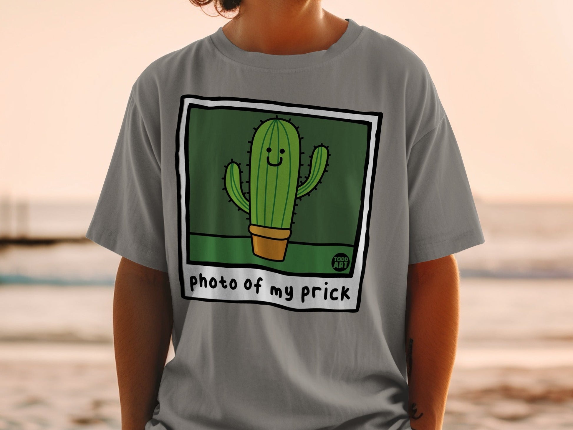 T-shirt with cartoon cactus saying "photo of my prick".