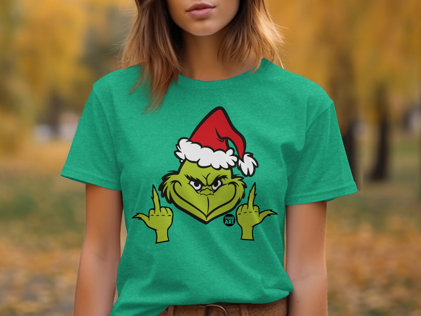 Festive Grinch Showing Attitude Graphic Tee